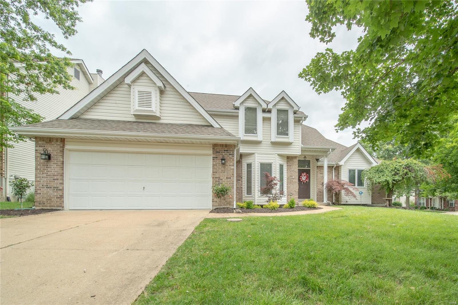 Buyer gains on this great house w/$50,000 recent updates!!! Curb appeal abounds w/fresh landscaping making this one a show stopper!! 1 ½ story w 2 story entry, Sep Din Rm, Great Room w/skylights provides a lot of natural light. Large Master suite w/coffered ceil, newly remodeled master bath w/double sink cabinet & pull out drawers, waterproof lux floors, walk in 4x6 shower w/rain shower, body jets, new toilet w/auto clean, soft close barn door, Walk in St Louis closet creates tons of storage w/bench. Kitchen w/solid surface counters, gas stove, new dishwasher plus breakfast rm w/bay win. New pedestal sink in ½ bath. Upstairs boasts large loft space for home office, 2 add’il spacious bedrooms & full bath. Man cave in LL w/ 2 bedrooms, Rec/Fam Rm & full bath. New blinds & fresh paint thru out. Garage recently dry wall w/amazing work space. Level fenced backyard w/new fence, patio &  corner cul de sac lot creates a lot of privacy. A Must see!