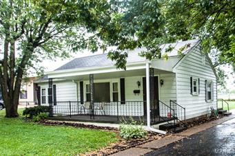 Welcome Home!  Don’t miss this 3 bedroom, 1 bath home on a large, level, partially fenced yard with storage shed and a huge covered front porch, perfect for listening to the rain!  This home is mostly maintenance free with aluminum siding, six inch gutters and down spouts.  Spacious kitchen and separate dining room along with a fabulous family room with picture window, perfect for entertaining!  There are 3 bedrooms (one doesn’t have a full closet the furnace is in there) but would make a fabulous office or work-out room.  The utility/laundry can also be used as a small storage area along with the two additional pantries. Other updates include an updated bath and newer hot water heater and a newer electric panel (approx 2 years ago) This home also makes a great rental for those landlords looking for their next property!