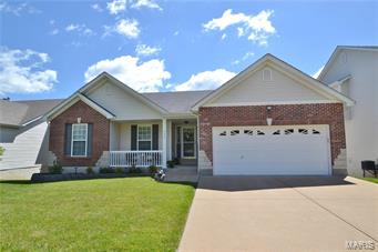 Welcome home to this gorgeous 4 bedroom atrium ranch style home backing to trees and decked out with many nice features.  A brick and stone front greet you. The expanded floor plan opens to a vaulted Greatroom and sitting/dining area w/hardwood flooring and atrium wall of windows offering a wooded view of the natural setting.  The kitchen and breakfast room areas are separated by a large breakfast bar with granite surfaces, glass tile backsplash, black appliances and adjoining glassed in sun room providing the perfect place to enjoy your morning coffee.  The main floor master suite has a large walk in closet, and luxury bath w/dual vanities, soaking tub & sep shower.  The atrium staircase opens to a family room/sitting area, along w/4th bedroom, full bathroom & tons of storage space or more room to finish!  A level backyard can be enjoyed from the sunroom or extended aggregate patio. Conveniently located near George Winter Park, min from Gravois Bluffs shopping, restaurants & highways. Additional Rooms: Sun Room