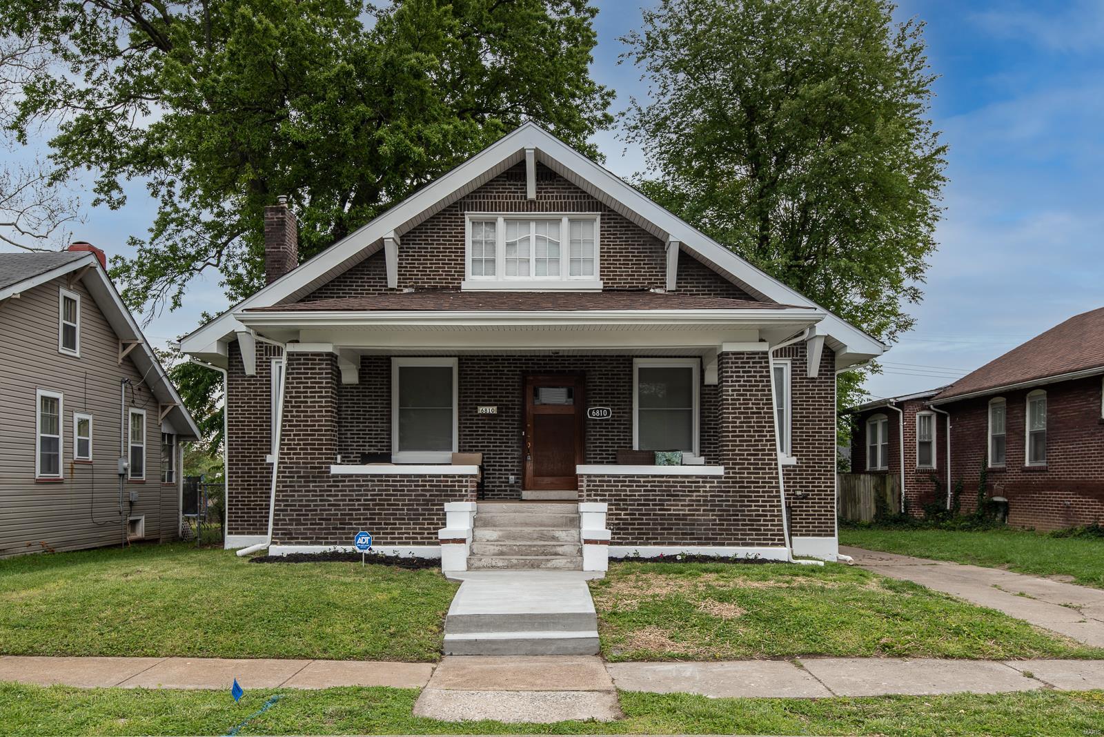 Beautifully renovated and incredibly stunning three bedroom, 2 bathroom brick home.  This is a true forever home, with all the modern finishes complimented by the historic character.  Enjoy a full brick fireplace, refinished woodfloors, two orginal stained glass windows, gorgeous detailed wood work and more.  This one and a half story home also features a main floor bedroom with a private sitting room. The second floor bedroom has a private full bathroom.  The attention to detail and high quality craftsmanship shines throughout, from the gorgeous tile backsplash in the kitchen to the meticulously clean lines along the crown molding.  The basement is clean, with high ceilings and filled with possibility. Come see it today!