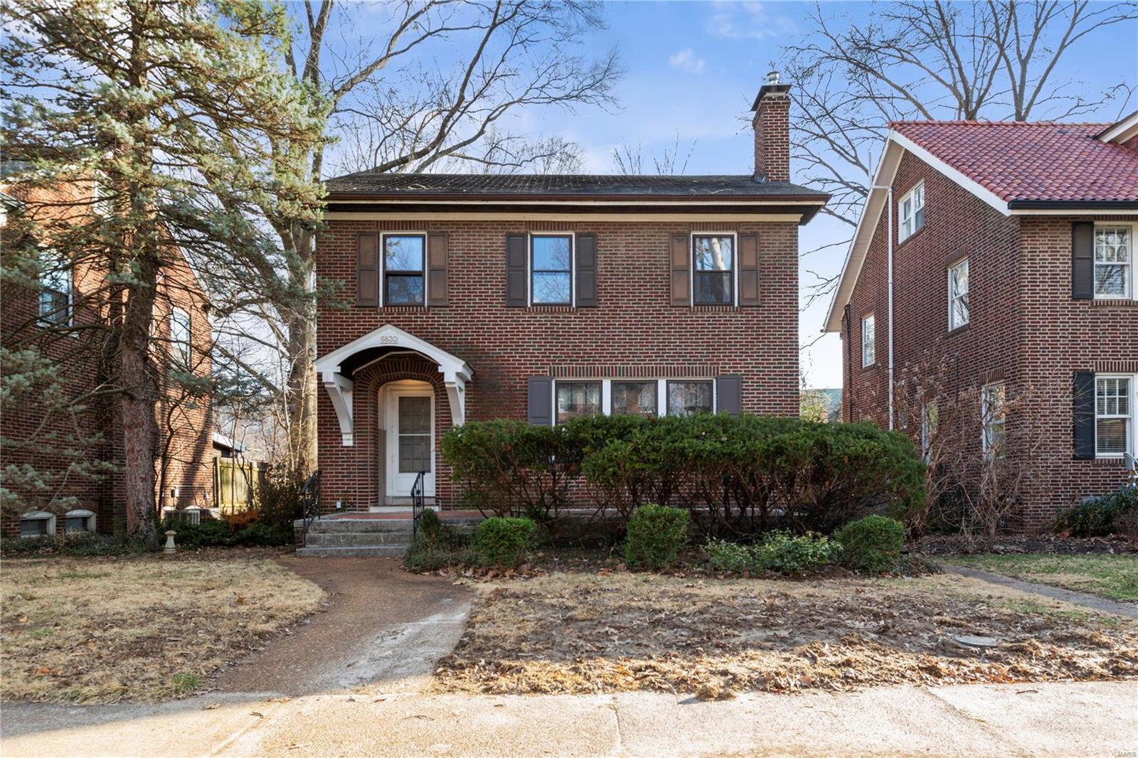 6830 Pershing - a home with a whole lot of history and a whole lot of love left to give! Located in the highly sought after Ames Place gated neighborhood in close walking distance to The Loop, Forest Park and WashU. Once home to actress Mary Wickes and on the same street of Tennessee Williams childhood home. History and charm abound with updates throughout- new furnace installed Feb 2021 and new main water line installed 2021. Garage roof replaced 2018. Basement has a full bath ready for a makeover. A little love and some fresh updates and this home is the perfect family home or great investment opportunity! “Life's not a spectator sport. If watchin' is all you're gonna do, then you're gonna watch your life go by without ya” You won’t want to watch 6830 Pershing go by without ya!