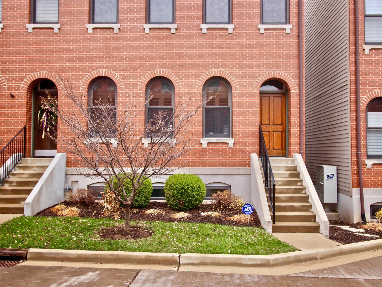 At over 2200 sq ft, 3 bedrooms, 2.5 baths, a sprawling floor plan, 2nd floor laundry, a private fenced yard, & a 2 car garage, this stylish town-home is an unmatched opportunity to live in an urban playground that is Lafayette Square! 1013 has everything one would expect in a great urban townhouse: soaring 10’ ceilings, open floor plan, vaulted ceilings in all 3 bedrooms, plantation shutters, HUGE windows, oak plank wood floors on main level, gorgeous fixtures, & a finished walkout lower level. Some of our favorite features include custom-built kitchen w/ granite & SS appliances; 2 living areas (a living room w/ a gas fireplace & family room); a formal foyer; & a master suite w/ double sink vanity, separate tub & shower, & walk in closet. Only minutes from Lafayette Park, Downtown STL, major highways, Soulard, nightlife, & other major universities & hospitals! Just steps away from 21st Street Brewers Bar, Vin de Set, PW's Pizza, Planters House, Eleven Eleven, & Charleville Brewing Co.