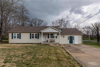 Down sizing? First time homeowner? Look no further! This home is located perfectly! The yard is private, level, and very little stairs for any looking for the ranch feel. Why rent when you can buy for such a low price in this up and coming area?
