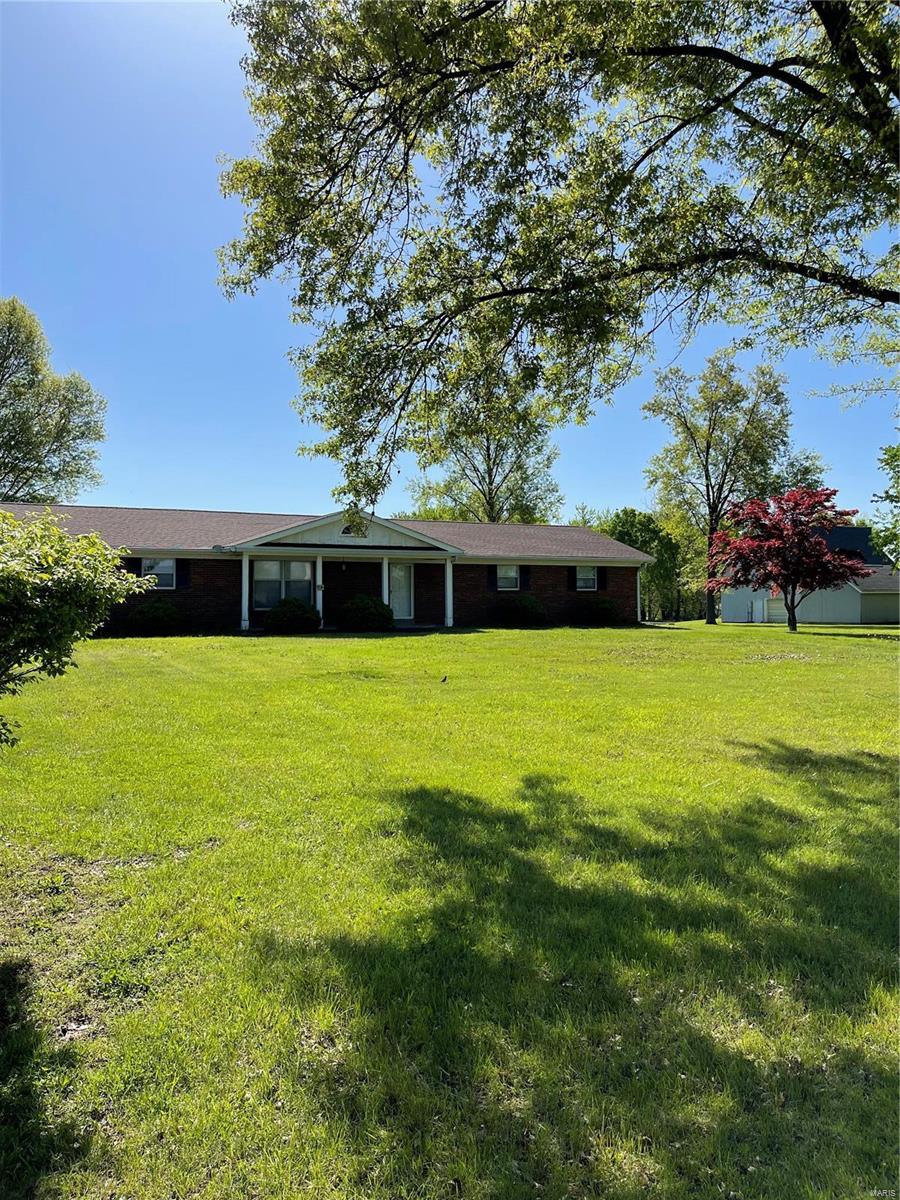 5.77 acres of prime real estate in unincorporated St. Charles County/Francis Howell School District.  Ideal property for new, higher use development.  Home residence is at the end of useful life and no access permitted at this time.  Garage and two (2) outbuildings sold with property.  Property and all buildngs sold "As Is."  No disclosures.