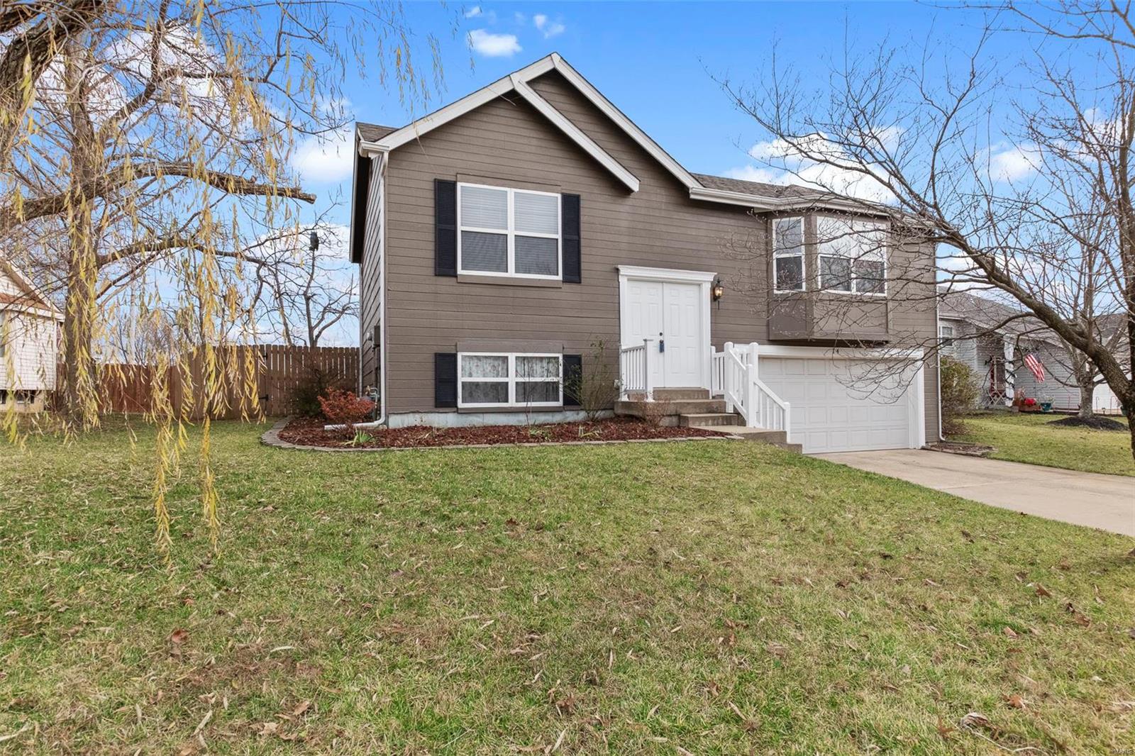 WELCOME HOME! THIS ADORABLE 3 BED 2 BATH HOME IN FT. ZUMWALT SCHOOLS IS FRESHLY PAINTED THROUGHOUT WHOLE HOME AND BRAND NEW CARPET INSTALLED 12/9/2020. Located in an established neighborhood in St. Peters with convenient & easy access to shopping, schools and Highway 70. This split level home features great living space, a fenced yard, deck, attached 2 car garage and shed in the back. All appliances are included. This home offers generous sized living and dining rooms, 3 bedrooms and 2 full bath.  The deck off the dining room area makes for wonderful outdoor grilling and relaxing. The 2 car garage is over sized. Seller is offering a 1 year Home Warranty from Choice Home Warranty for up to $600.