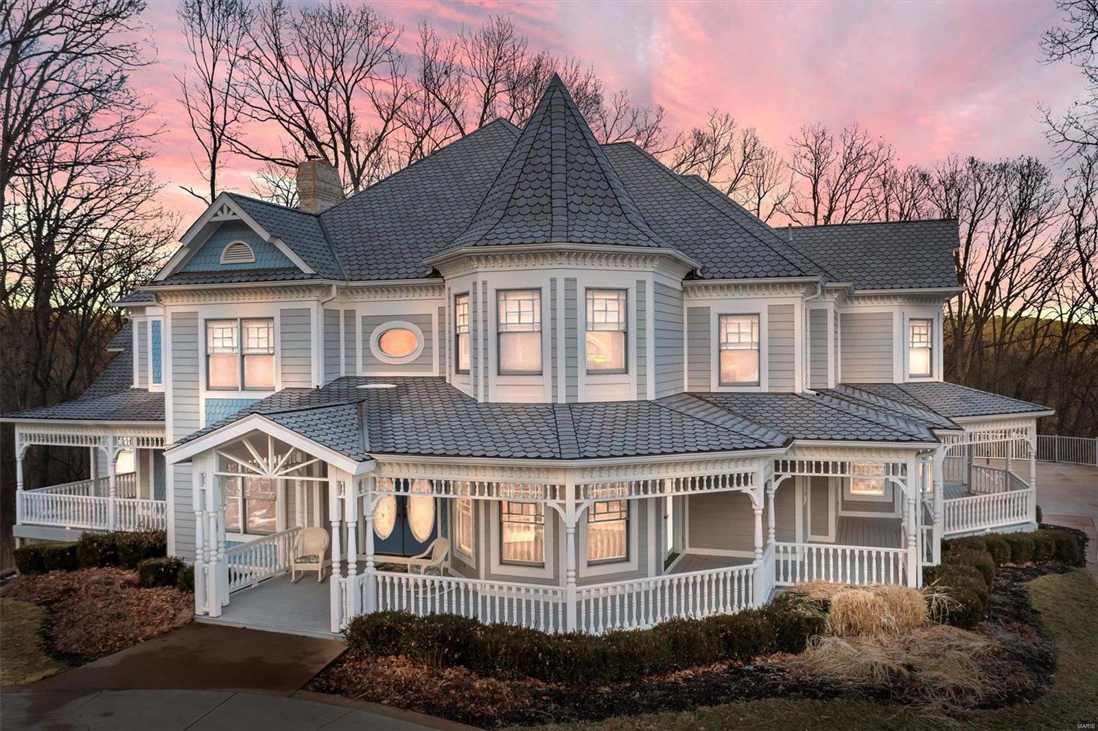 This Queen Anne style Victorian 1.5 story home has been freshly painted a neutral color, if you have looked at it before make sure you take another look! The home is situated on 5 picturesque acres that your able to enjoy from every angle of your wrap around porch. You will notice throughout the entire house the meticulous attention to detail and the true craftmanship that went into this home. With over 7500 sq. ft this home offers 5 bedrooms, 7 bathrooms, a custom crafted library, formal dining room, gourmet kitchen with center island, custom cabinets, stunning two-story great room with fireplace and a first floor master suite with fireplace. The second floor offers a beautiful office with floor-to ceiling stone fireplace and 4 additional great size bedrooms. Talk about an entertainers dream on the lower level, billiards room, living room with brick fireplace, handcrafted custom cherry wet bar, media room, full bath and a full workshop located underneath the 3-car garage.