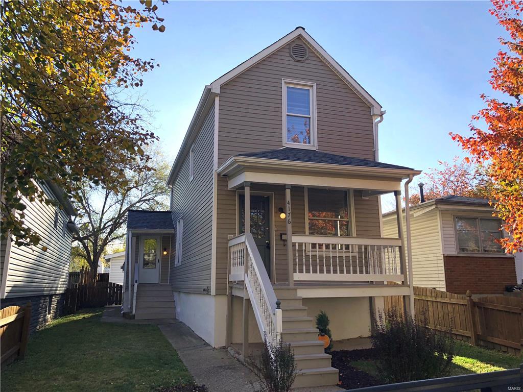 Great new price!! Spacious and updated home near Carondelet Park in south St. Louis. Excellent curb appeal with a lovely facade, Victorian style full covered front porch, back patio, one car garage, one car parking pad and fresh landscaping. First floor is awesome with a large living and dining room with lovely crown molding and a big clean kitchen with eat-in area, walk-in pantry, and secondary side-entry porch. 2nd floor has new carpet and features two large rooms. Freshly painted throughout with contemporary colors, new lighting and the basement has been freshly dry-locked and epoxied.