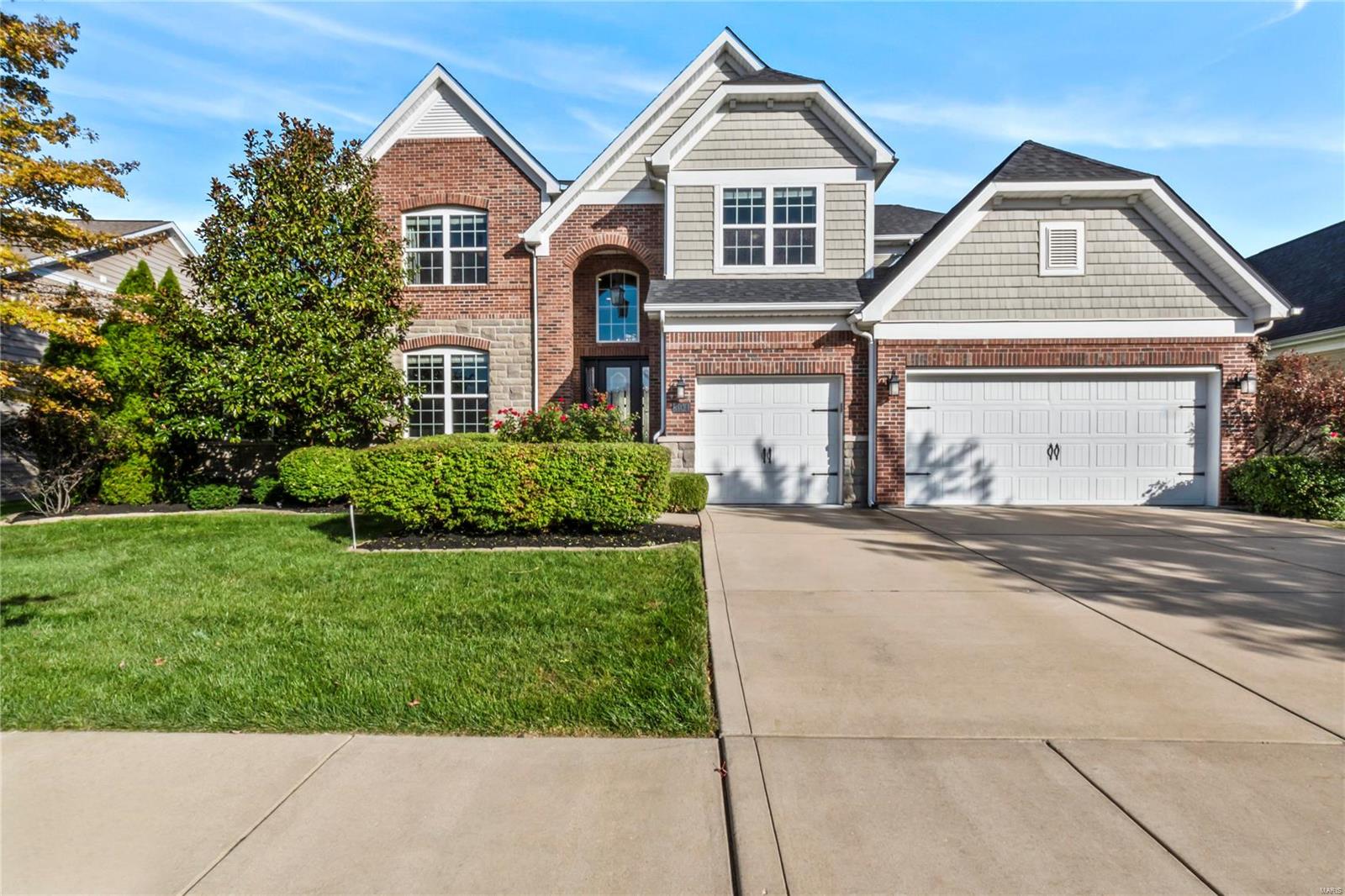 Stunning 1.5 Story home in desired Reserve at Chesterfield with 5 beds & 4.5 baths and approx. 6000 sq ft of living area to enjoy!  The beautiful foyer invites you in w/tall ceilings trimmed with crown molding & perfect well-lit office space. Gorgeous Engineered Walnut Wood flooring leads you into a 2 story living room w/an abundance of natural light from the gleaming floor to ceiling windows & see thru stone gas fireplace. Gourmet kitchen w/custom cabinetry, top tier granite & SS appliances! Exceptional Master Bedroom suite has a sitting area w/coffee & mini bar and luxury bath.  Large main floor laundry & utility room offers storage lockers & planning area. Expensive upper-level has 3 beds w/California designed closets, 1 en suite & 1 Jack & Jill bath, playroom, & loft area. Huge finished basement w/5th bed and full bath.  Oversized 3 car garages w/electric vehicle charging station. Built-in speakers throughout the house with Sonos system. Roof 2022.This house has so much to offer!