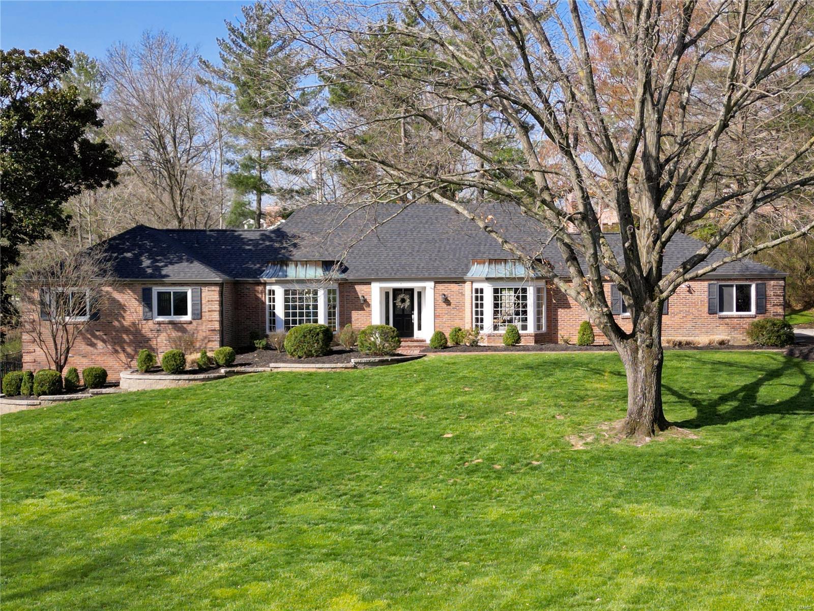 Gorgeous 1.5 story, 4 bedroom brick home located in Thornhill Estates, Town & Country between Topping & Mason Roads. Sprawling beauty sits high on over 1 acre, features a resort style backyard with fenced in yard to a pool, new composite deck with pergola, lush landscaping & new stairs to the fantastic walkout remodeled lower level family & game room. Many updates in the past few years- refinished hardwood floors throughout, updated 4 full baths, main floor master suite luxury spa bath, laundry & custom closet, 2 spacious bedrooms upstairs that share a full bath. Entertain in the enlarged kitchen with island that overlooks the glorious backyard. This home flows from the inviting dining room, the front facing living room that opens to the lovely family room that is centered around the gas fireplace. Stunning views out every window! Side entry garage w/ epoxy floors, new roof/gutters, siding, HVAC, freshly painted, Award Winning Parkway West-Welcome home!