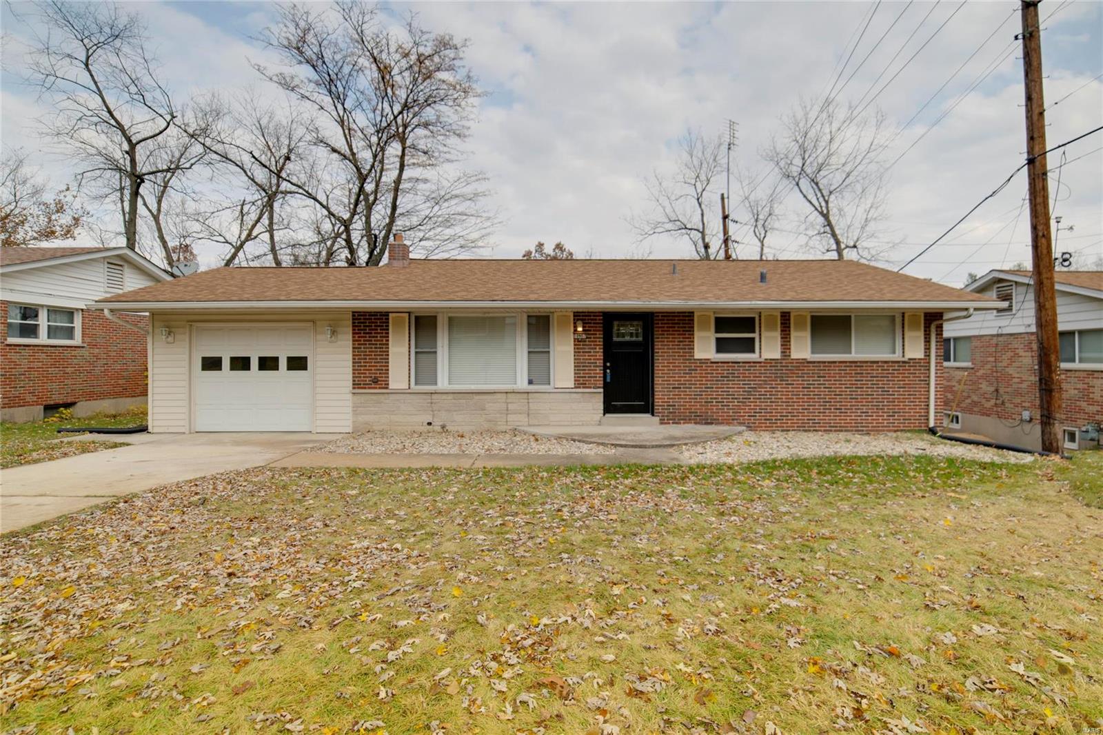 Say hello to this beautiful 3 bed 2 bath ranch with over 1,400 square feet nestled in the Warson Meadows subdivision! Inside you are greeted by your living room with gorgeous wood floors that continue through most of the home! Your kitchen has been freshly updated with new appliances, cabinets, and countertops. Step out onto your large deck to enjoy all summer long! Down the hall is three generously sized bedrooms and full bathroom! Head downstairs to your massive finished recreation room perfect for entertaining and a second full bath! This home has been updated with all new blinds and a newer roof! Refrigerator, washer, and dryer all to stay! Seller is providing a home warranty! Don't miss out! Schedule your private showing today!