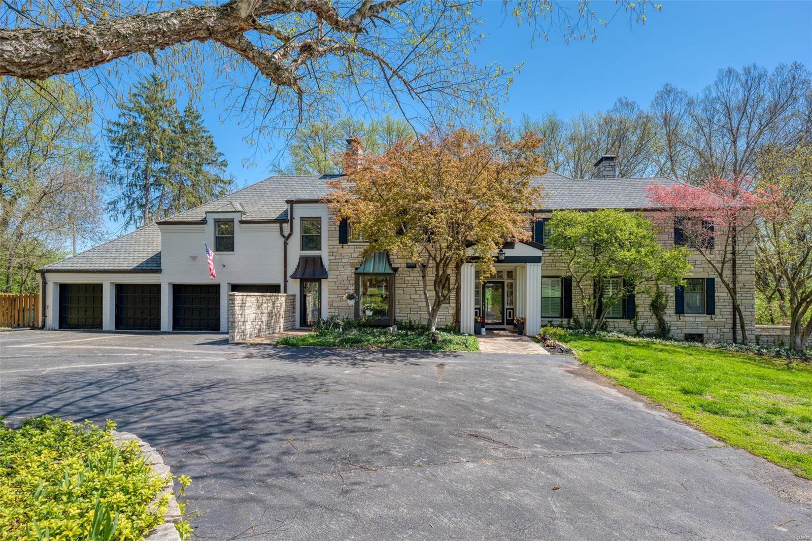 This French Country estate home offers so much privacy on almost 3 acres. One of the original properties to all Spoede this former apple orchard and now lovely home allows for abundance of light in individual living spaces creating an open feel in each of the unique rooms. Spacious kitchen with sub zero appliances, ice maker and breakfast nook leading to the pool and back yard are just for starters. Head on up to your oversized master bedroom with south and west exposure and his/hers closets. There is a Jack & Jill bedroom setup on the other side connecting two spacious bedrooms. Head to your large fourth bedroom with private loft that can be converted back to a 5th bedroom with 3/4 bath & private entrance. Finished with rec room, cedar closet, and flex room on a side walkout.  patio fully redone and fire pit added in 2018. Pool pebble tech, cool deck, systems and more done in 2015 and pool has half bath.Home is being sold as is and has been inspected AGENT OWNER.