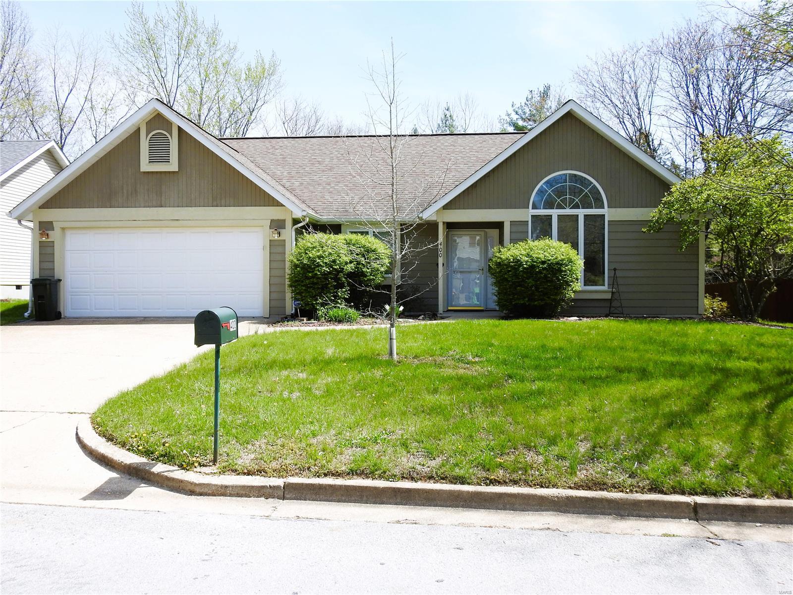 Immaculately maintained with an abundance amount of natural light. This 3 bedroom 2 bath home features vaulted ceilings in the public areas making it feel spacious and airy. Built in bookcases in one of the secondary bedrooms. Exceptional closet space in the primary bedroom. Primary bathroom features a walk in shower. 
Walkout onto the deck from the dining area and enjoy the beautifully landscaped yard with mature trees.