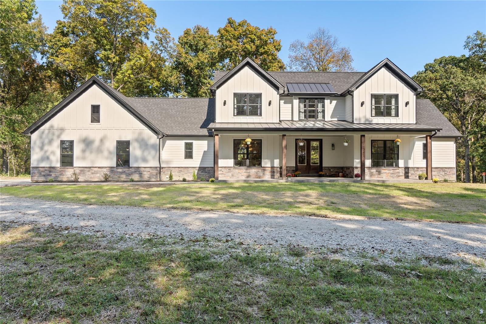 Have you been waiting for the PERFECT white farmhouse on some land? THIS IS IT! Beautifully nestled on over 10ac of prime DEFIANCE countryside, this stunner is ready for its new owner. Custom stamped concrete, beautiful craftsman Douglas Fir millwork & gorgeous Anderson 8ft double front doors welcome you home. The great room boasts a wood fireplace, 18ft ceilings and custom lighting. Beautiful hickory engineered hardwoods! Custom Amish made Hickory and Maple cabinetry throughout with stainless steel Kucht kitchen appliances complete with beverage fridge and HUGE entertaining island are wow-factor. Primary suite, guest room with dedicated bathroom, separate powder room, custom built-in cubbies in mudroom, separate laundry with planning desk and walk-in pantry round out the first floor. Second floor boasts TWO supporting bedrooms, a full bathroom, loft space AND unfinished storage! Howell SD, minutes from wineries & easy access to highway 40! Additional Rooms: Mud Room