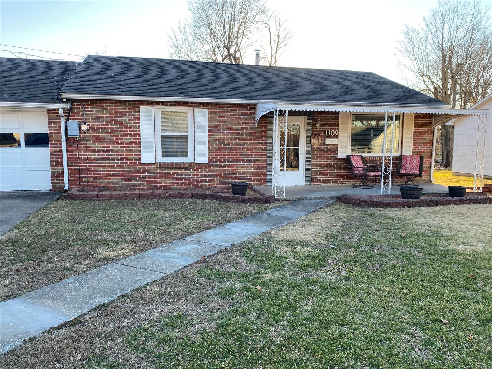 Talk about a charmer...this is a "big, small house"!  Built solid in the 50's, this two bed, one bath home offers spacious rooms and plenty of charm.  It boasts brand new windows, a 10 year old roof, and a newer water heater.  Enjoy the large level back yard, the big patio and the one car garage plus storage.  If you are paying rent, you will more than likely have a house payment that is less.