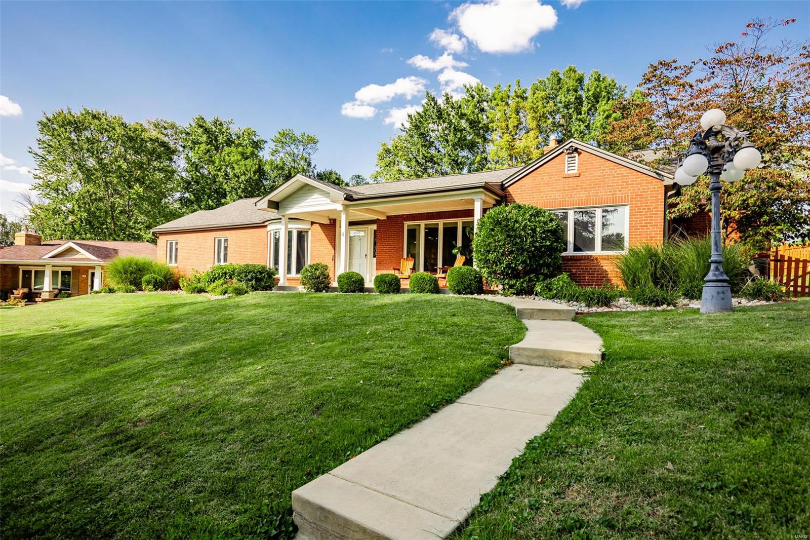 Welcome to sought-after STL Hills Estates! This unique ranch sits on one of the largest lots in the neighborhood. You will love the open concept featuring a large family room with WB fireplace & recently updated kitchen. Both lead out to a darling patio & sprawling back yard -- the perfect place to host gatherings and entertain year-round. A large formal dining room with large picture window, and an additional bonus room in the front of the home currently serves as a home office, but could be converted into a 4th bedroom. Huge private primary bedroom suite addition features a large walk-in closet, spa-like bath w/ jet tub, double sinks & large shower. 2 additional bedrooms are down the hall. Full bath w/ separate shower, bath & linen closet serve additional bedrooms & guests. This lot is superb! Space for pool, sport court, garage mahal or expanding the home out or up! Please note the basement is NOT a FULL basement. Partial basement features one room for laundry, systems and storage.
