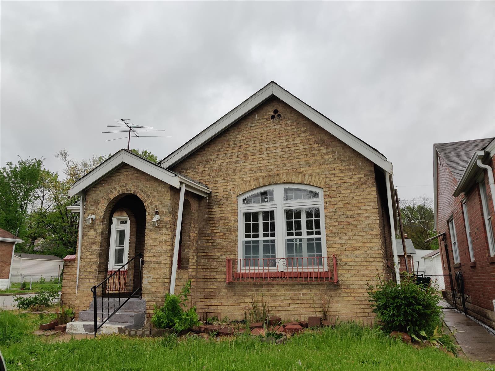 Great investment opportunity for this Brick Bungalow located on a corner lot. This 2 Bedroom home will be great for a rental. Home offers off street parking, garage, full basement, fireplace and much more! 

Property being sold "as is," buyer must view property prior to acceptance.