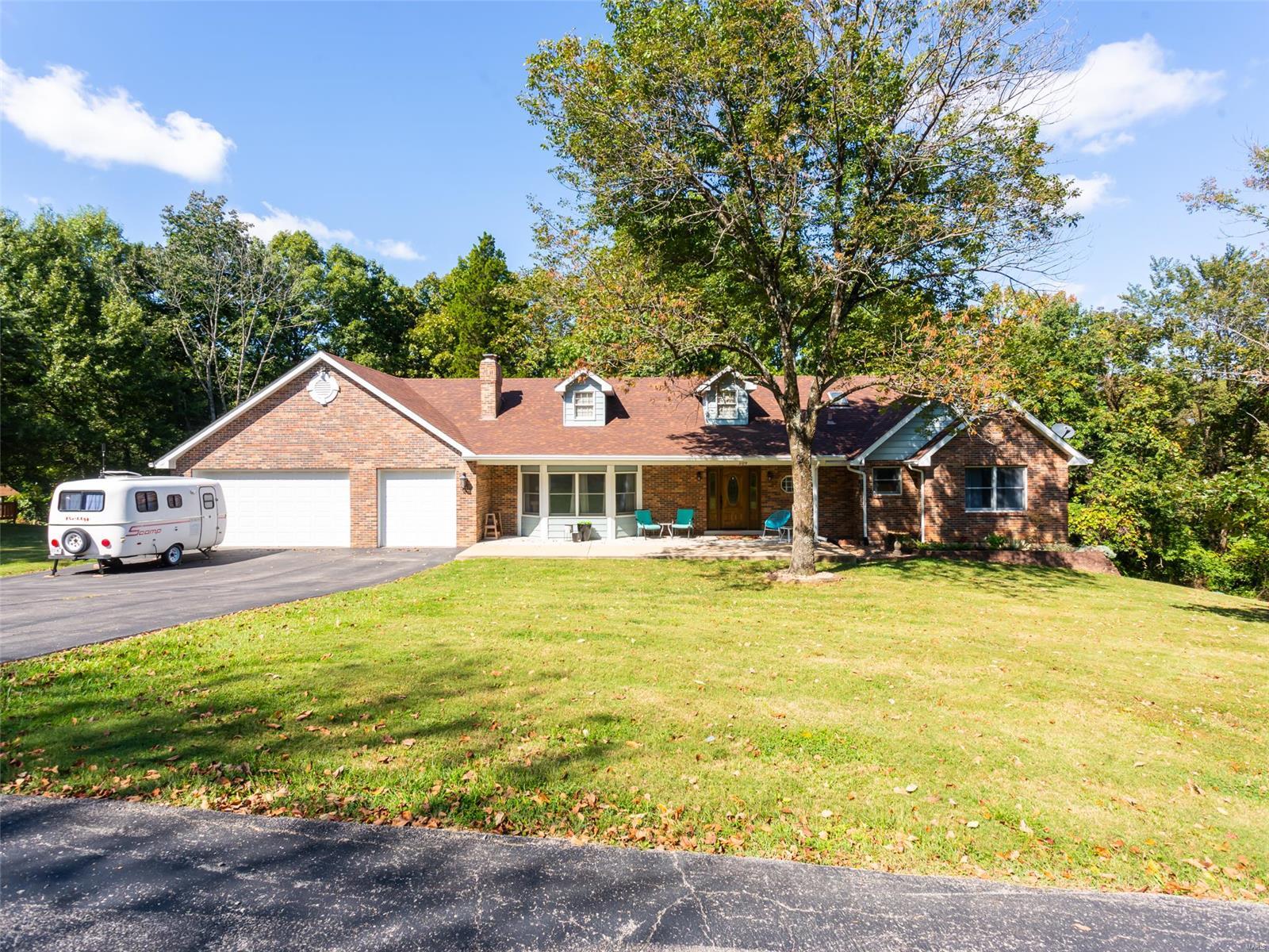 Dream Home, 3.3 acres, Three Car Oversized Garage, Four bathrooms, Walkout basement, Main Floor Laundry, Open Floor Plan!
From the farmhouse front porch, to your own private ATV & walking trails-This Arnold property is located within Heritage Hills. Beautiful wood floors, vaulted ceiling, a bay window, and a full brick wood burning fireplace establish that feeling of home right when you enter! The freshly painted, custom kitchen is gorgeous & complete with a separate dining area, built in desk, center island, a skylight, separate MFL room, and half bathroom. Large owners bedroom features a walk-in closet & a full bathroom. White trim & 6 panel doors thru-out, Extended driveway will easily park multiple vehicles, mature trees providing a private-park like setting! The LL  is mostly finished, family/rec room, 1/2 bathroom, huge storage room w/shelving, separate utility room. Passed occupancy inspection provided. Fox C-6 schools. 25 min to downtown STL. Seller relocating out of state.