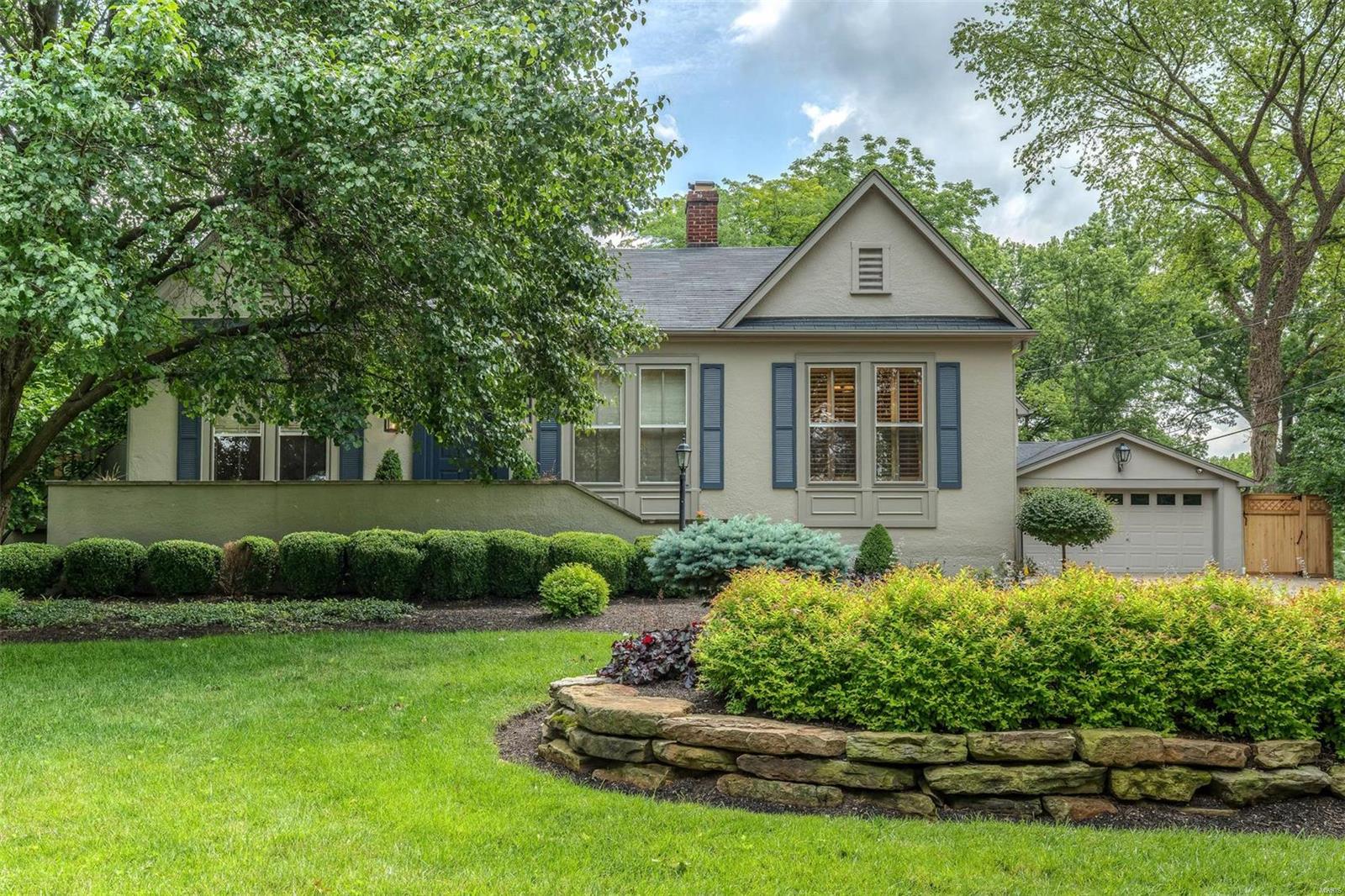 In perfect harmony with its surroundings, the home nestles on an acre with artfully composed gardens, spacious stone patios, and an in-ground swimming pool. Remodeled and expanded to create inspiring gathering spaces and offer modern amenities, walls of French doors and skylights fill the home with natural light. A vaulted great room with a stone fireplace provides for memorable entertaining. The impressive kitchen features a walnut island, a wood burning fireplace, breakfast room, two office niches and the finest in appliances including a Dacor coffee station. The stylish butler’s pantry includes Carrara counters and leaded glass displays. In the original footprint are formal living and dining rooms as well as a den that can be converted to a third bedroom. The master suite hosts a gracious dressing room, two walk-in closets, and a travertine bathroom. A fabulous wine cellar and tasting room can be found in the lower level. Conveniently located, this is a rare and delightful offering! Additional Rooms: Wine Cellar