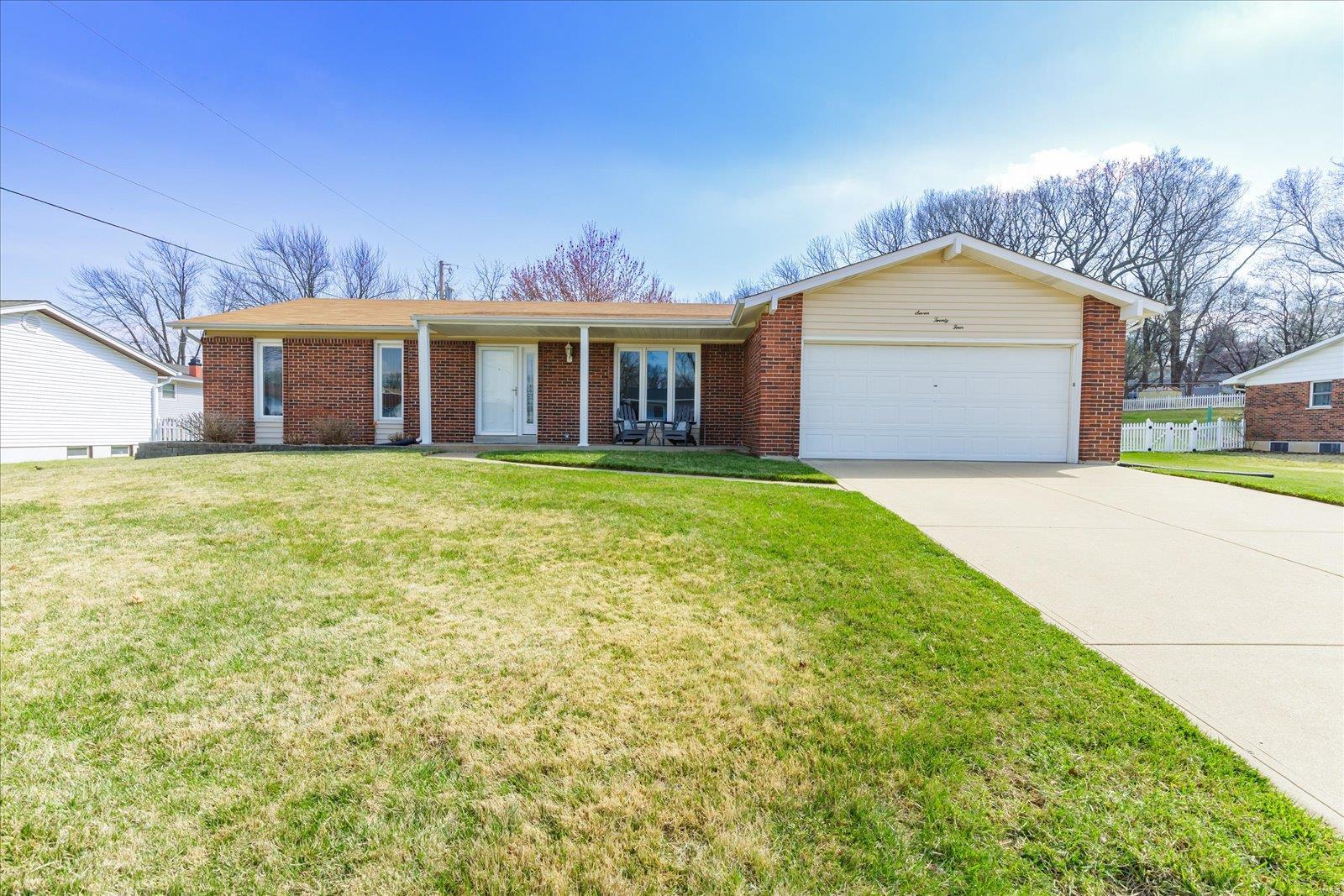 Three bedroom, two full bath ranch with great updates!  This is a very clean, well cared for home with a very nice level backyard surrounded by a cute vinyl picket fence, plus a shed. Fresh, neutral paint 2023, and newer luxury vinyl plank throughout kitchen, dining, family room and hallway.  Newer carpet in the 3 bedrooms as well.  Living room is open to kitchen/dining and has a gas fireplace. There has been a full remodel of the hall bathroom (and it's gorgeous!), and master bath has been updated.  Kitchen has white cabinets and stainless appliances, plus a new window.  The refrigerator is new as of 2022 and it stays!  Other updates include basement waterproofing, replacement of rear gutter and side downspouts, newer HVAC (2018), newer sump pump (2020), screen door (2023), and updated basement electrical wiring (2017).  Washer and dryer to stay also.  Showings start F  riday 3/14!