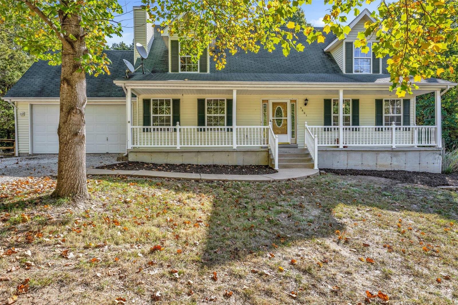 This fantastic Cape Cod style, 1.5 story, 5 bedroom home with walk-out basement & full rough in bath is on approx 2.6 acres is freshly updated! The deck and backyard would make a great place for gathering, pets, play and enjoying the seasons and privacy.  Beyond the fence your own wooded area and creek. Beautiful main floor master suite with jet tub & separate shower & large open freshly renovated kitchen. Great covered front porch with vinyl railing to relax on after a long day, as well as numerous other updates. Easy Commute - only approx 15 minutes from I-44!!