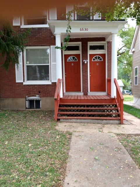 Nice two family in ucity within walking distance to the Loop.  Many updates. Can be converted into a single family home.
