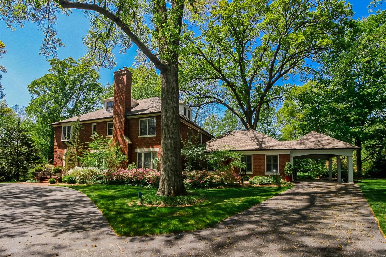 Stunning 3sty on 1.19 acres in prestigious Hampton Park. 7 Bd/7Bth (5F/2H) showplace w/nearly 7000 sqft. 1st Flr boasts Living Rm w/stone FP, 2 sets of windows & French doors; formal Dining Rm, Guest Ste w/private entrance, walk-in closet & laundry ~ all handicap accessible! Kitchen w/island, granite, Breakfast Rm, cozy Hearth /Sitting Rm w/wet bar; Powder Rm, large Family Rm w/FP. 1st Flr also finds Powder Rm & Utility/Mud Rm w/Butler’s pantry. Sprawling 2nd Flr w/wonderful Master Ste w/luxury Bth, His & Her vanities, Jacuzzi tub; Sitting Rm & beautiful Offc; 3 add’l Bds, 2 full Bths & 2nd Flr Laundry. 3rd Flr w/2 more large Bds & full Bth! Highlights: zoned HVAC, circular drive, sprinklers, alarm & O/S 2-car garage. Unfinished LL w/plenty of storage. Relax outside on brick patio, or deck w/pillars & admire enormous level yard. Perfect home for entertaining! Great location – near downtown Clayton’s restaurants, shops & galleries, WashU, Forest Park & hospitals.