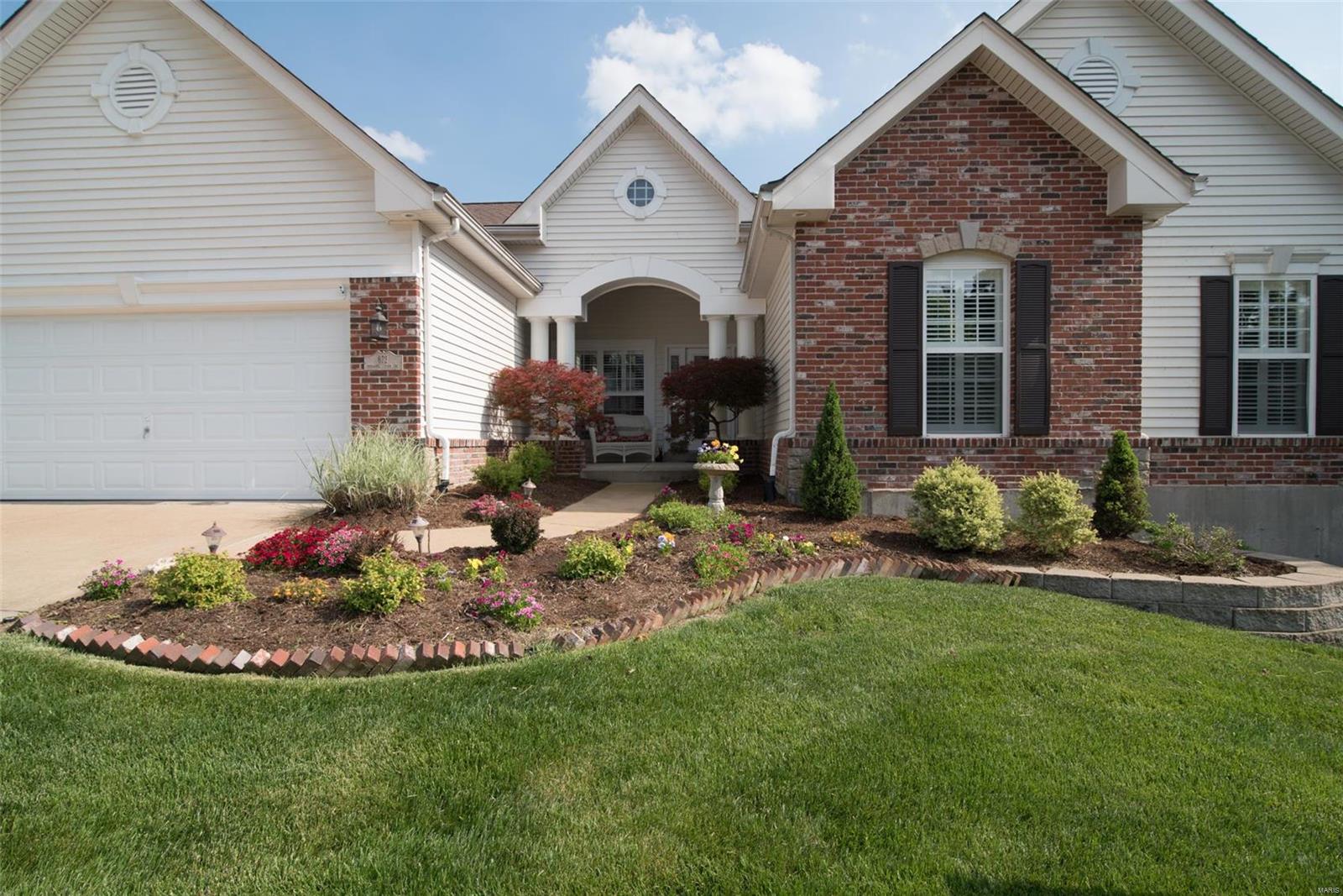 Large atrium ranch in The Legends Golf Community. Featuring impressive views of the Meramec River and Valley to enjoy during every season. The covered front porch affords a place to relax and watch the world go by. Open the door and you'll be met by an open floor plan including a window wall & gas fireplace in the great room, a chef's kitchen, dining room, and main floor laundry. Wood flooring abounds plus tiled bathrooms. Master en-suite features a bay window and separate walk-in closets for him and her. Other main bedrooms are connected by a Jack-N-Jill bath. The lower level is a walk-out to the large patio and more finished space for hanging out! The family room offers a wood burning fireplace and separate space for a pool table. The wet bar, full bath, & bedroom complete the lower level. One owner home has been decorated in neutral décor. See the attached supplement to see all the many features of this wonderful home.