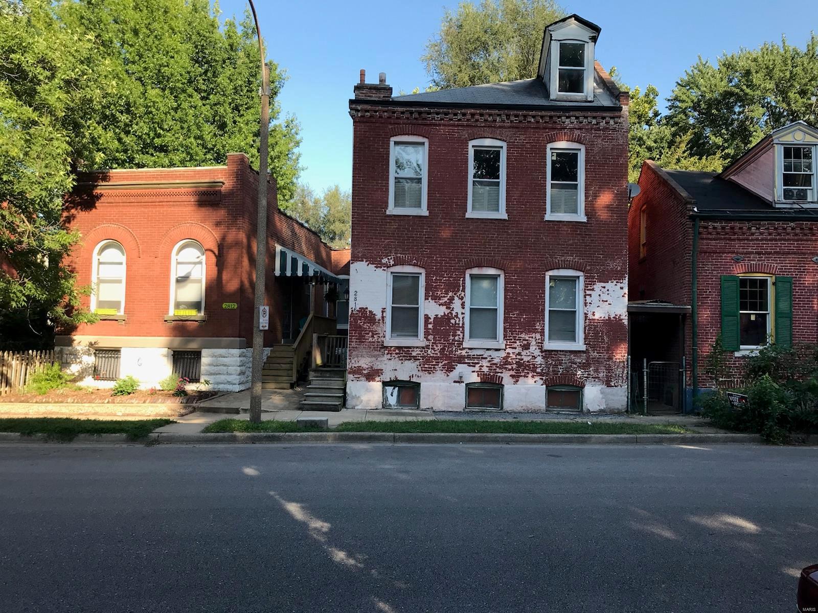 Great opportunity to get into Benton Park neighborhood and add your finishing touches to this historic brick home! 3 Beds, 2 full baths, open floor plan, and a newer enclosed 2-car carport...all for $135k! 9.5' ceilings, original pine floors, transom windows, and cool 3rd floor loft-like bonus room w/skylight can be a large 3rd BR or den! Open floor plan on main level is great for entertaining, and the kitchen comes with a full set of stainless steel appliances. Yes, there's still work to do, but much has already been done: New HVAC in 2009, entire back wall tuckpointed, and 2-car carport built in 2014. Updated water service, sewer stack, and 200A panel. Full basement with 7'+ ceilings. Large fenced backyard. Walk to parks, Cherokee St, Soulard, and great bars/restaurants (Sidney St Cafe, Peacemaker, Yemanja Brasil, Venice Cafe, Small Change, Cones + Cups, Cafe Piazza, Blues City Deli = 6 blocks or less!) AS-IS sale, needs updates/rehab--but priced to sell! First showings 9/8/18!