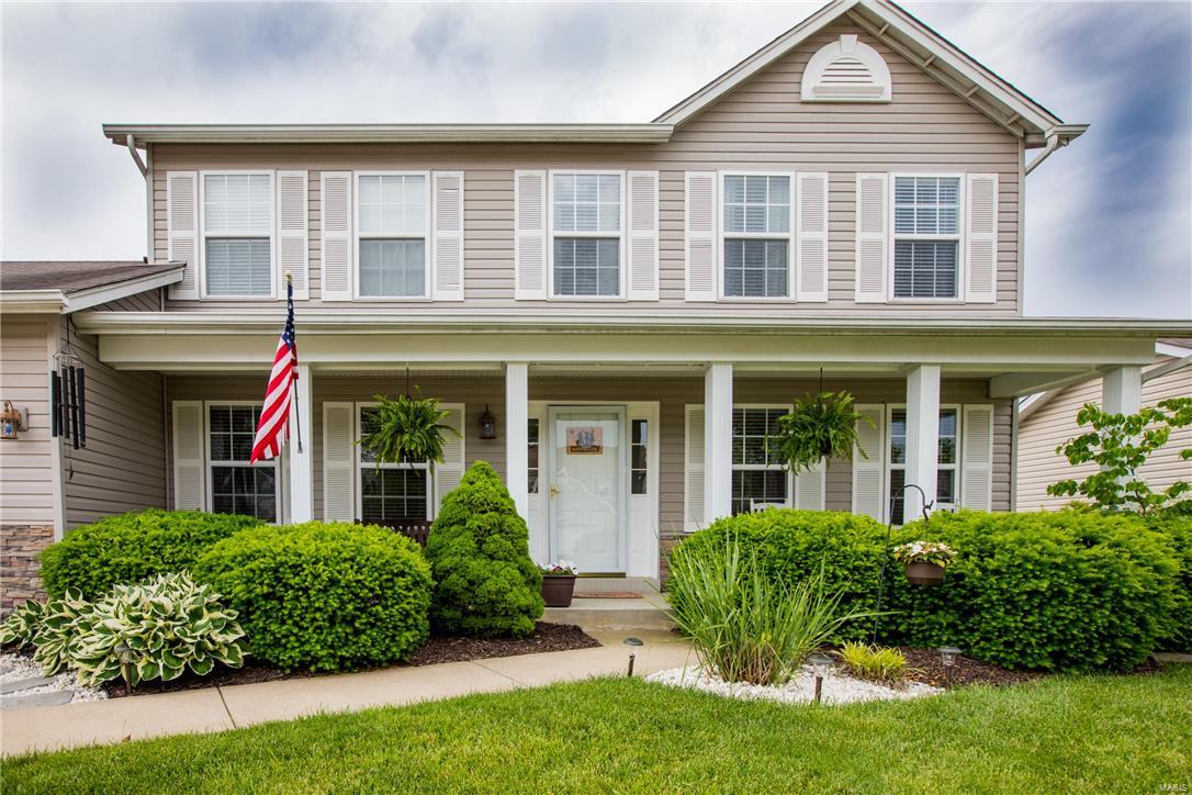 You will feel like you’re home from the moment you drive up to this spacious 2,200+ sq. ft., 2 story house. The long front porch is inviting and the finishes inside will have you ready to call this place “Home”. Updates include beautiful outdoor landscaping in both front and fenced-in back yards, stone veneer, custom kitchen cabinetry w/siltstone counter tops, tile back splash, stainless appliances, custom lighting, custom blinds, and laminate flooring. Separate dining room and formal living room give the main level added space and make it great for entertaining and hosting events. Custom wood stairs lead you to the finished lower level with rec area, wet bar and full bath all w/custom lighting and stonework. Don’t let this great house in this great Wentzville subdivision pass you by!
