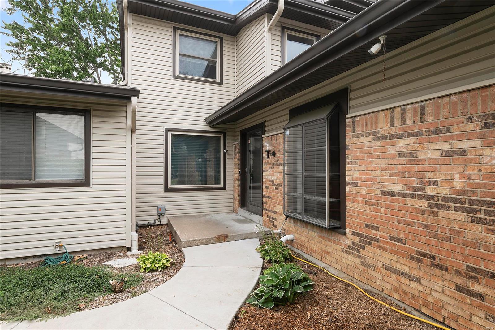 Welcome to this beautifully updated 2+ bed, 3.5 bath condo. It features an open floor plan with lots of space. Full of natural light from the two large skylights in the family room and the french doors leading out to two private patios. The large family room has one of the two wood burning fireplaces, custom built-in glass shelving unit and CEDAR accent wall. The main floor master suite features a custom walk-in closet, private full bath with walk in shower.The open staircase takes you to the second floor bed room, full bath and loft area perfect for office. The LL Den has a fireplace, wet bar and french doors out to the back yard.  ENDLESS SPECIAL features include, a FULL house back up generator, Custom remodeled kitchen and breakfast room (2012) Main floor laundry, (wash and dryer included),distressed hard wood floors in Dinning, Family, and entry hall. Built-in security system, and much more. See list at showing. Amenities include 2 pools,2 tennis courts, clubhouse ,on site MGT. Location: Other