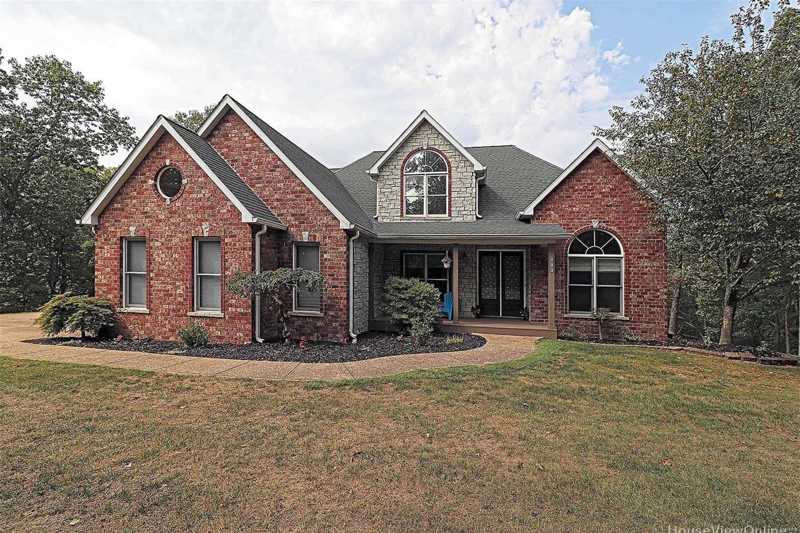 Beautiful Brick home in  DESIREABLE Winchester Hills Subdivision.  Four bedroom, three bath Home sits on 6.79 acres m/l. Large open floor plan with hardwood floors, large windows, dining room, main floor master suite and laundry room. Large eat in kitchen boasts stainless steel appliances & a breakfast bar. Living room with stone fireplace walks out to deck with amazing views. 
Finished walkout basement with additional bedroom, bathroom, family room and game room.
Call TODAY for your personal tour!!!