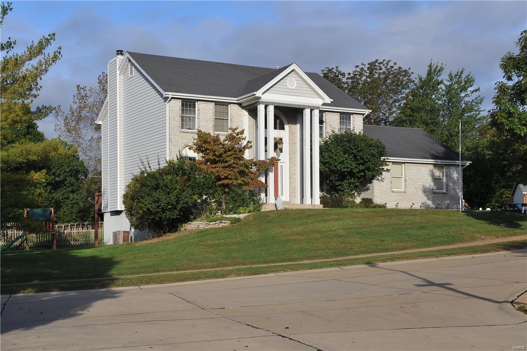 Spacious and updated 2 story home available in Lake Chesterfield for lease!  Lots of space with 4 bedrooms, 2 full baths, 2 half baths and finished LL. Beautiful kitchen includes granite counters, Travertine and glass tile backsplash,  custom 42" maple cabinets, planning desk, & bay window door leads to large deck.  Maple and birch wood floors on main level are Gorgeous!  Fireplace in family room with built in book cases and corner seating. Upper level includes master bed with vaulted ceiling, lux bath with Jacuzzi tub, Brezo rain shower and granite counters. 3 other spacious bedrooms with a second updated bath in hall.   Walk-out LL is finished , great space for rec area, and 1/2 bath. Oversized 2 car side entry garage. Fun neighborhood with walking trails, pool, clubhouse, & lake. Close to Wildwood town center and shopping. Rockwood school district. No smoking, pets negotiable.