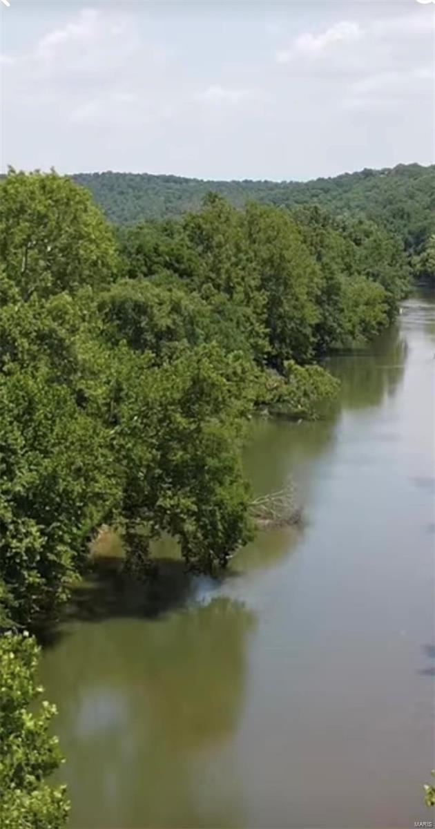 Bring your building plans! If you're looking for river access for your float trips, this 3.89 acre property is your answer! Located on the Meramec River, 1.25 miles up river from the Huzzah confluence, you'll have direct access to the water. You'll be just moments from Onondaga Cave State Park, with cave tours and miles of hiking trails as well as the Ozark Trail. Don't miss out on this wonderful opportunity to have your own private retreat on the river!
Electric runs through the property that can be connected to. There is also an old well on site that current owners have never used and believe does not function properly.