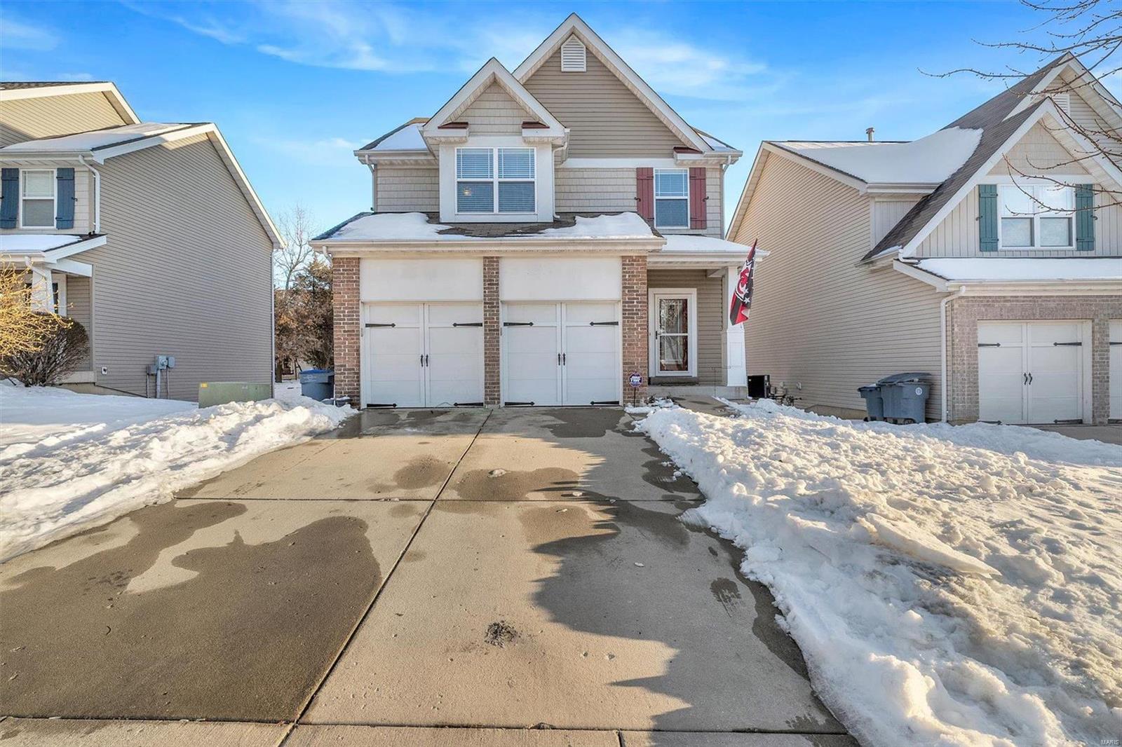 Welcome to the Wyndgate Community! This free-standing Townhome offers access to walking trails, a lake, pavilions, basketball courts, playgrounds, and community pool. Enjoy community events like the 4th of July parade, Egg Hunt, and more. The "Wyndgate Commons" handles all your lawn care needs, making life easy. This spacious home features 3 bedrooms, 2 full & 2 half baths, and a lower level with built-in bookshelves, a bar, and walkout to a brick patio. The kitchen boasts Silestone counters, 42” cabinets, and new appliances. Relax by the gas fireplace in the living room or enjoy the bay-windowed dining room. The master bedroom en-suite includes a jetted tub for relaxation. Located in the Wentzville School District, this home has a security system, sprinkler system, main floor laundry, a deck, and beautiful landscaping. Whether for lifestyle, convenience, or relaxation, this home has it all! Conveniently located to numerous restaurants, grocery stores, entertainment & highway access.