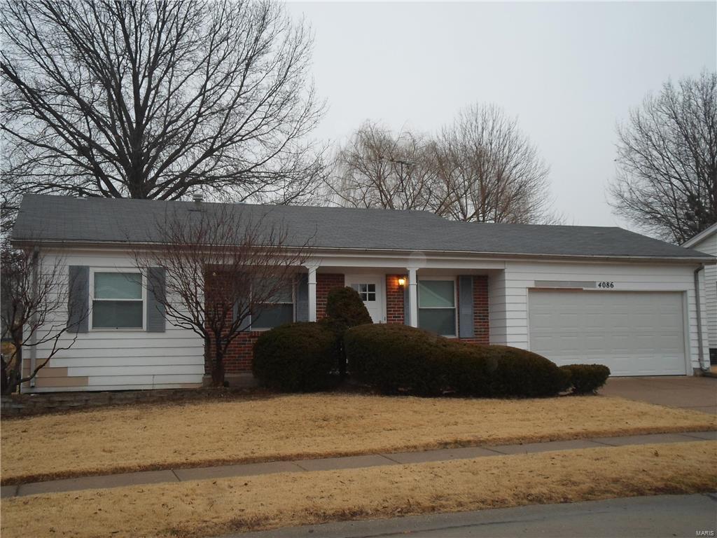 Come see this updated 3 bedroom ranch! Love the kitchen with its dark chocolate cabinets and new gas range and range hood and dishwasher, island and pantry.  You will love the gleaming wood floors throughout the whole house! Updated baths and light fixtures, alarm, 2 car garage and opener with keypad.  Fenced backyard with huge covered patio for entertaining! Lower level is finished with Family Room, full bath, big laundry room and 2 yes 2 walk in closets!!