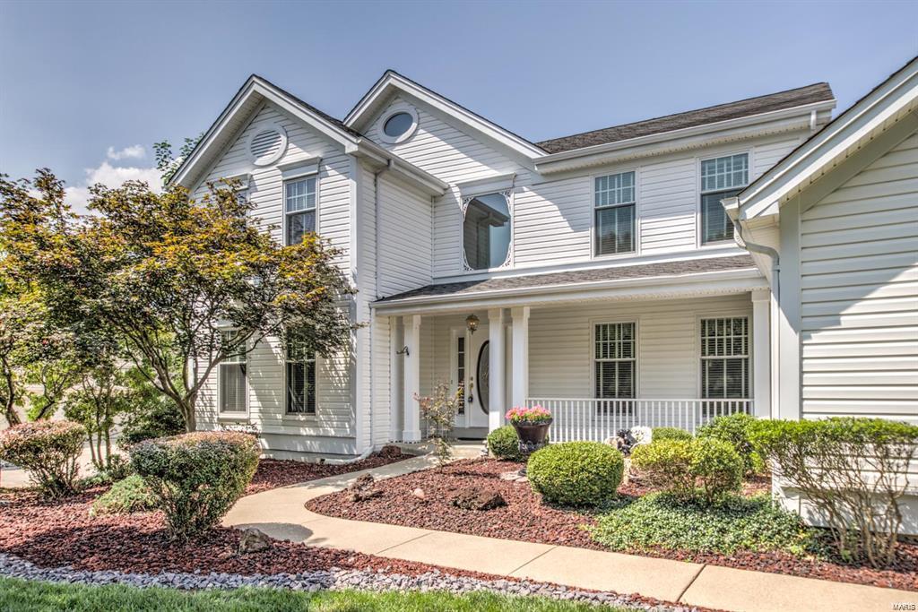 Two story cul-de-sac home nestled on large homesite in fantastic neighborhood! Soaring 2 story tiled foyer w/plant shelf, T-staircase & oak wood floors thruout main level. Vaulted kitchen w/center island, white cabinetry, downdraft cooktop, double wall ovens, walk-in pantry & plant shelf. Sunny BR opens onto a maintenance-free composite deck overlooking the beautifully landscaped yard backing to common ground. Formal LR & DR w/crown molding/trim. Spacious family room w/gas fireplace, 6 window bay, built-in bookcases, dry bar & crown molding/trim. Vaulted owner's suite w/bath boasts separate vanities, separate shower & soaking tub. Three add'l generous-sized bedrooms & Jack'n'Jill bath. Convenient main floor laundry w/tub. Walkout 9' LL is mostly drywalled w/ half bath, large windows & French doors leading to the expansive brick patio. 3 car side entry garage w/plenty of closets/cabinetry. Other features include in-ground sprinklers, attic fan, security system, humidifier & much more!!
