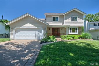 Welcome home to this meticulously maintained and updated home tucked away in a cul-de-sac in the Oak Hill Subdivision. Walk into your formal living room with an open floor and an abundance of natural light with neutral colors throughout. This home does not disappoint! Kitchen fit for a chef with stainless steel appliances, Maple cabinets, Center Island w/breakfast bar, backsplash and designer lighting that opens to formal dining with bay window. Family Room w/Fireplace w/Granite and Marble surround, accent lighting and sliding glass door opens to two story deck.   Upstairs greets you with Four spacious bedrooms and updated hall bath with Ceramic tile and updated vanity and lighting. Master bedrooms with ample closet space and updated master bath. Finished Walk Out lower level with built in book shelves, fireplace and mini bar! Close Access. This is not the home you want to miss! Rockwood Schools!