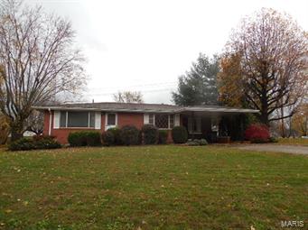 Location! Location! Location! This 2-3 bedroom all brick home sits on a double lot and has a fenced in back yard. This would make a great project for someone that like to do some remodeling and to add their own personal touches. After a long day relax sitting in the 9x27 sun porch. Mature trees add to curb appeal.
