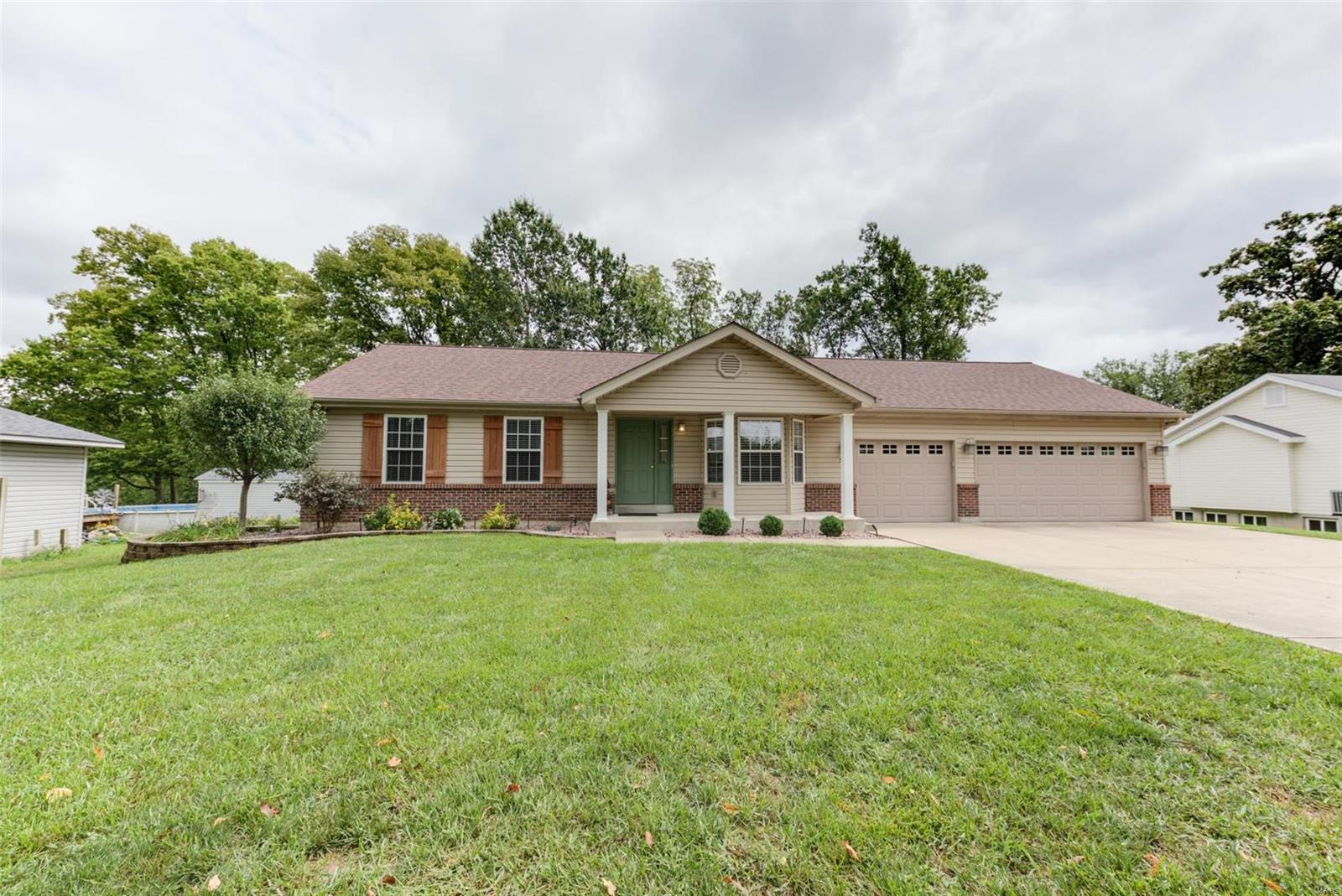 MUST SEE beautiful 3BD/3BA ranch on ½ ACRE WOODED LOT! Features include OVERSIZED 3 CAR GARAGE, vinyl siding w/partial brick elev, architectural shingled roof, encl soffits/fascia, 16x40 deck & covered patio. All electric home w/high efficiency heat pump w/APCO-X UV sanitation w/4" media filter. Beautiful 42” maple kitchen cabinets w/crown molding, under cabinet lighting, tile backsplash. Updated appliances: smooth top range/convection oven, convection microwave, and 3 rack dishwasher. Main floor laundry w/wash sink.  GRT RM w/vaulted ceilings & bay window. MBR suite w/private bath and large W/I closet. Finished basement w/full bath, features vinyl plank flooring, large media room w/surround sound & Lutron lighting controlled by app.  Wisenet security cameras w/app accessible viewing, Digital life alarm system w/thermostat, lights and garage door controls all operable from your phone!  This hidden gem is nestled away in private setting on a not-through street. This one won’t last long!