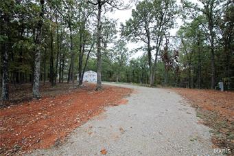 Tiny House in the makings or Hunters' Delight is what you get with this great little property.  The cabin is started with 200 Amp electric service, plumbing to include W/D connections, bathtub and sink (NO Toilet).  All situated on 3.2 wooded acres offering plenty of space for some peace and quiet.