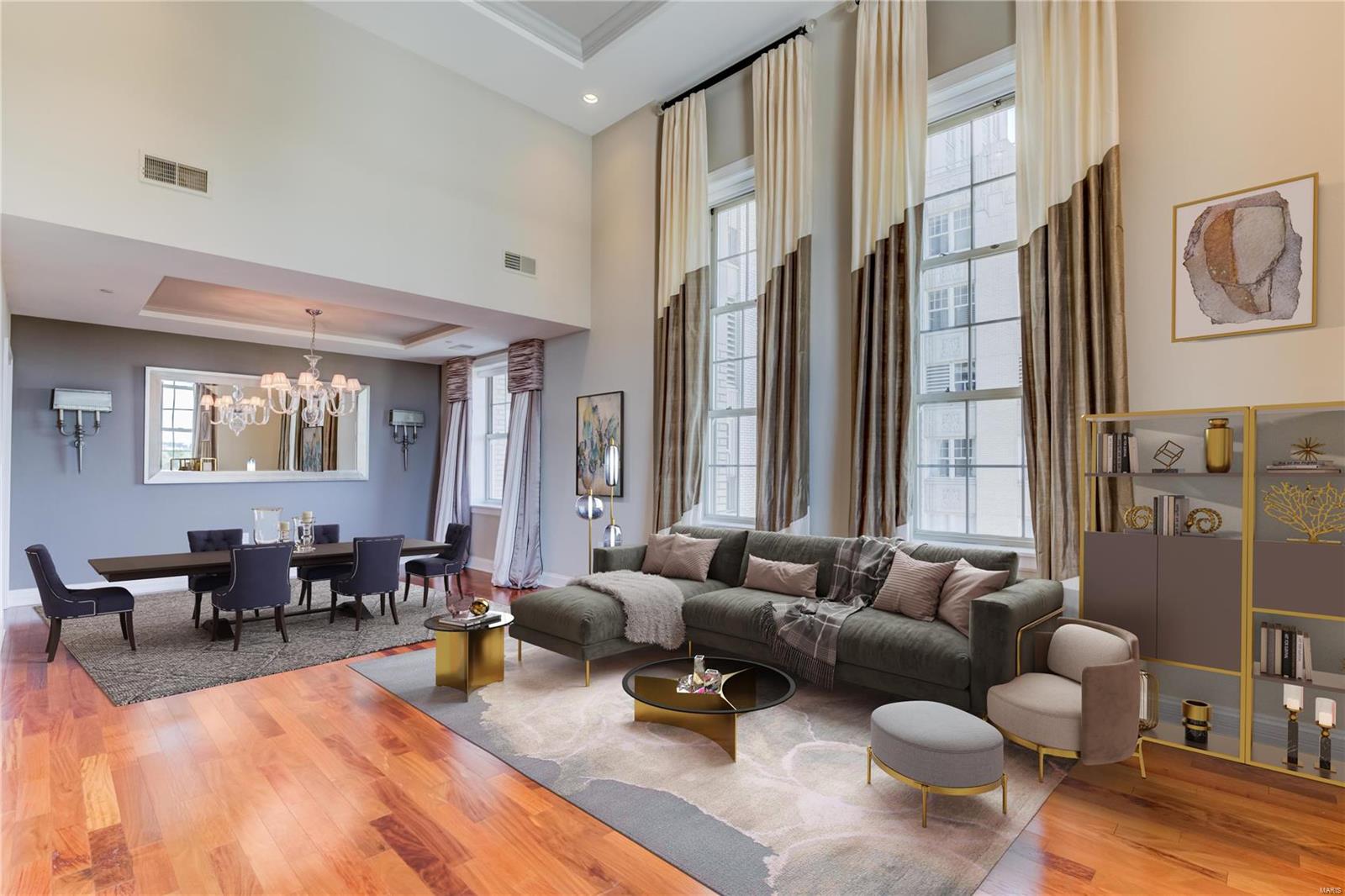 Spectacular corner unit with incredible views of downtown & the arch.Grand living room w/soaring 15ft ceilings & wrap around floor-to-ceiling windows. Featuring 1 bed,1.5 baths & 1241sqft & secure parking(2). Large entry foyer w/marble tile & coffered ceiling.Open floor plan w/hardwoods flowing throughout the living area, updated kitchen w/Thermador appliances,stainless hood,5-burner gas range,custom backsplash,new built-in refrigerator,granite counters & breakfast room w/gas fireplace & coffered ceiling, DR w/beautiful chandelier & coffered ceiling.Owners suite w/new carpet, plantation shutters, walk-in custom closet, raised vanity w/dual sinks, marble floors, walk-in shower & jetted tub. Powder room & in-unit laundry w/stackable washer/dryer. Amenities:green terrace w/gas fireplace,2 Wolf gas grills,community room w/full kitchen,valet parking,concierge,on-sight security,storage area,bike room,3 fabulous restaurants,movie theater & heated pool. UNIQUE UNIT-FIRST TIME ON MARKET! Location: City, Corner Location, End Unit, Upper Level