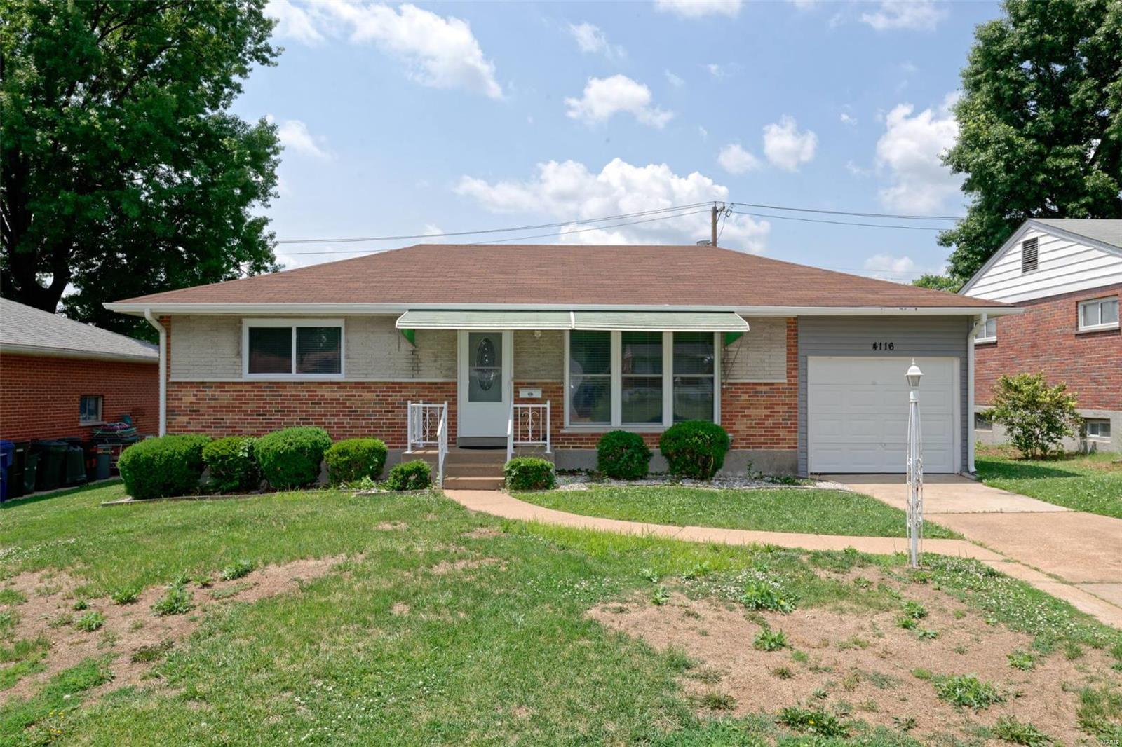 Updated brick bungalow with a 1 car garage. This 2 bedroom/2 full bathroom home has an open floor plan with a spacious living room, dining room, & a gorgeous kitchen. The kitchen has been recently updated & includes espresso shaker cabinets, stainless steel appliances, granite countertops, glass backsplash, a center island, & ceramic tile floors. Through the hallway are 2 spacious bedrooms & an updated bathroom with oil bronze fixtures and neutral tile. The lower level has a large recreation room, retro bar, laundry area, full bathroom with stand-up shower, & a large storage room. The back yard has plenty of room for family gatherings & includes a covered back porch & a fenced-in level lot. Other features include: new vinyl windows, refinished hardwood floors, new vinyl siding on the garage, automatic garage door opener, & an outdoor storage closet next to the garage. Great starter home at a great price.
