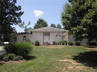 ELEGANT LIVING - CLOSE TO TOWN!  This meticulously maintained 3 bedroom, 2 bath home graces 1 acre m/l lot beautifully landscaped with perennial bushes and flowers for all seasons.  It offers twelve foot ceilings, updated kitchen and appliances with built-in double ovens, spacious bay windowed breakfast or dining room, a formal dining room that could alternately be used as an office off the front entry, a jetted tub, separate shower and double sinks in the master suite, walk-in closets in all bedrooms, double linen and coat closets, wood burning fireplace, main floor laundry with washer and dryer included, peaceful screened porch (37'7" x 8'9") that opens both from living and master overlooking decorative pond and the farm beyond, full basement with finished hobby room plus work benches and peg board and a 10' x 10' shed with concrete floor and electric.  Newer heat pump and 12 inches added insulation.  Chicken houses and fencing may stay or be removed per Buyers' wishes.