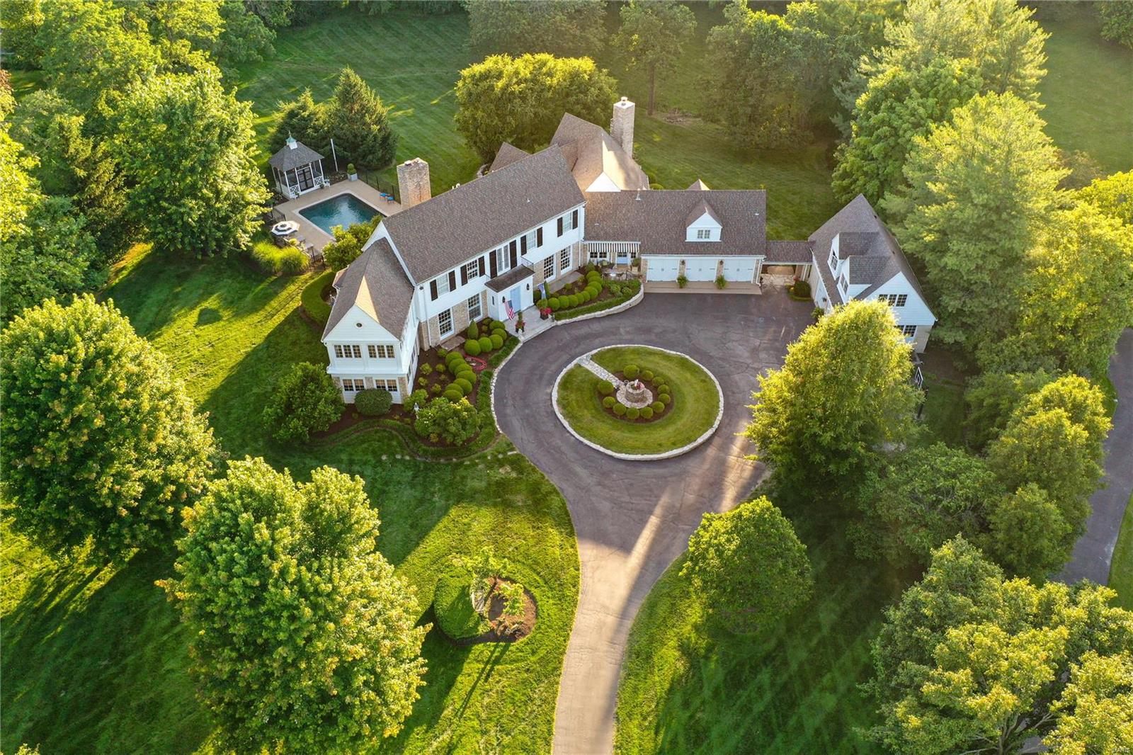 Stunning estate property on 2.37 manicured acres located in the private gated Village of Country Life Acres. You truly do feel as if you are in the country even though you're minutes from hospitals,highways, and shopping."Full Cry" was built in 1929 to stand the test of time and has been significantly updated. Over 5700 square feet of living space comprised of 4+ beds, 3 full and 3 half baths plus 5 cars of garage space… 3 attached and 2 in the unfinished carriage house which has roughed in plumbing and is ready to be finished as the perfect guest cottage or MIL/nanny suite. This home is perfect for entertaining with large spaces opening to patios, porches and pool surrounding the house and carriage house. Additional Rooms: Mud Room, Sun Room