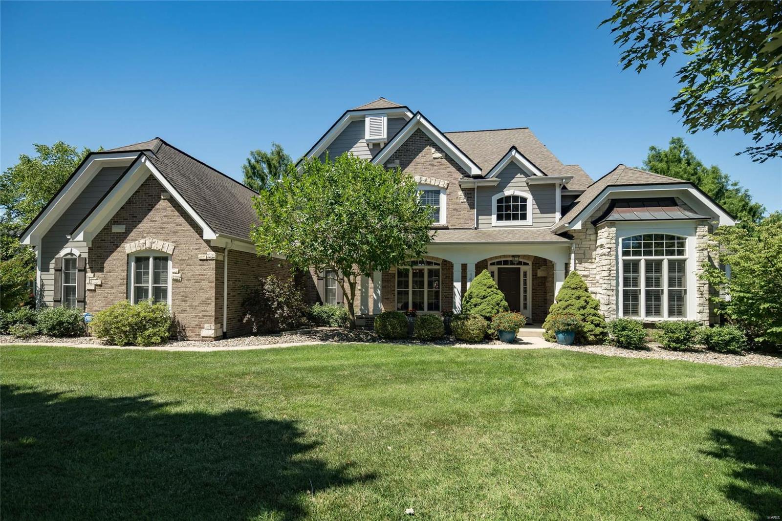 This stunning custom home is tucked away on a private, quiet cul-de-sac of eight luxury homes added to the prestigious Brook Hill subdivision approximately ten years after the original homes. The meticulously-maintained home is on a more than half-acre lot, offering lavish landscaping and a classically-designed salt-water pool with fountains and a newly-refinished decking. It is a true family home, with 6,462 sq ft of gracious living on three levels, including a 2-story entry, private main-floor office, inviting dining area, spacious Great Room, updated eat-in kitchen (plentiful storage, newer appliances, newer quartz countertops, walk-in pantry), a hearth room with a vaulted ceiling, main-floor updated laundry room, and a primary suite with two large walk-in closets and  a luxury bath. Rich hardwood flooring throughout most of the home. Five bedrooms & six baths. Prof fin LL features bedrm, rec rm, & media rm. Upscale finishes w/updating throughout.