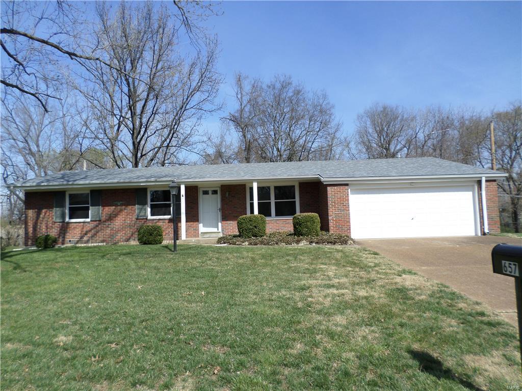 Move in ready! Shows great! Newly refinished gleaming hardwood floors! Freshly painted through first floor and parts of basement! 2 Full baths on the first floor! Newer roof and nice thermal insulated tilt in windows! 2 Car Garage! High efficiency furnace! Nice covered patio off the family room with real wood floors that are gleaming! Some newer fixtures. Great curb appeal.