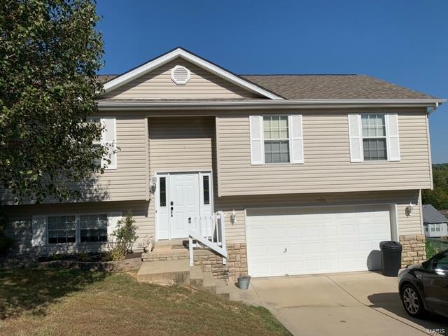 Open House, Sunday 10/03/21 from 11 am until 2 pm. 3 bedrooms, 2 full baths, a bright kitchen, and an incredible view on a 1/4 acre yard. 3/4" Bamboo Solid Wood Floors and brushed-nickel light fixtures showcase much of the home, providing an open and airy feeling. Escape to the Master Retreat with a private full bath, ceiling fan, and walk-in closet. The multi-level deck is an entertainer's delight, with an additional 500 SF of space awaiting you and your guests for summer BBQ's and other fun times. Roof installed in 2015. The 25' x 21’ over-sized garage is perfect for extra storage or a workshop. For more room to move, the lower lever is awaiting your finishing touch with a roughed-in bath. Another bonus for the first-time home-buyer, the stainless-steel refrigerator stays!