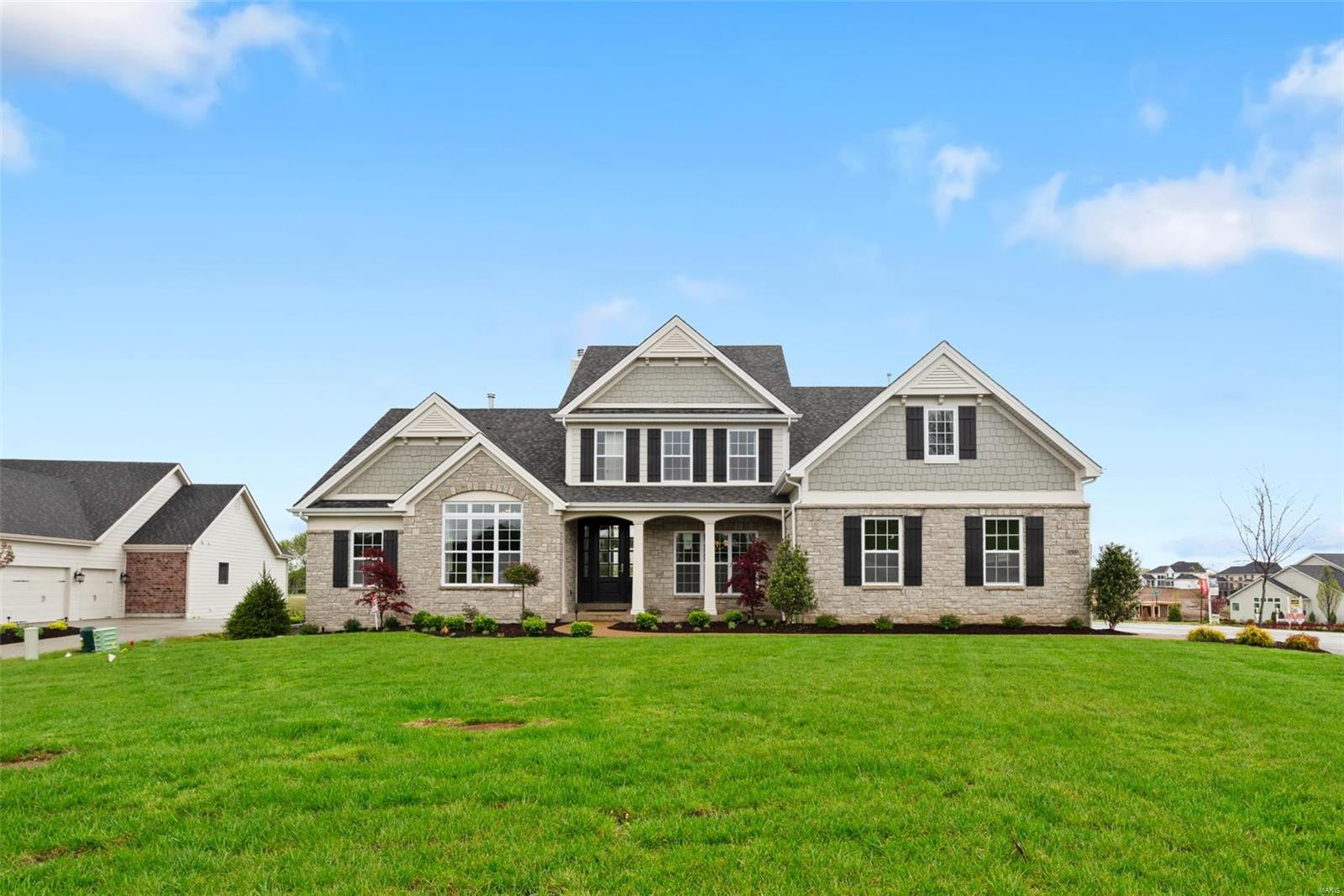 Beautiful open soty and a half plan in the Premier Chesterfield community of Fienup Farms. This 5 bedroom and 4.5 bath home boasts a 3 car side entry garage, 9' foundation pour, 9' first floor ceilings with vaults/coffers, covered deck with fireplace, custom cabinetry, Wolf/Sub-Zero Appliances, Quartz countertops, extensive trim work, wood floors, wet bar, great room fireplace and much more. Additional Rooms: Sun Room