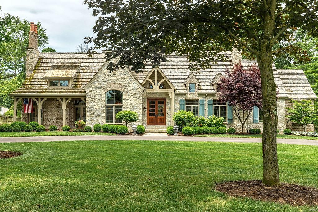 This stunning home offers remarkable design, luxury amenities, sophisticated architectural details! From the entry foyer and halls, lined with French tile - to the hand hewn beams in the soaring ceilings of the living room and family room - astonishing craftsmanship abounds. Enjoy cocktails in the bar overlooking the lovely backyard; or get some important work done in the exquisite birchwood office/study, featuring a charming fireplace. The bright chef’s kitchen delights with two dishwashers, full sized subzeroes, huge pantry, cook’s stove; it opens to an enormous family room with stylish built-ins and stone fireplace. There are six sets of French doors strategically set for entertaining, great flow, and outdoor enjoyment. First floor Master suite has it all! And, three bedroom suites grace the second floor as does a bonus fifth bedroom/rec or work out room. The ten foot pour in the basement is set up with roughed in bath and convenient walkout doorway. Covered patios back and front! Additional Rooms: Mud Room
