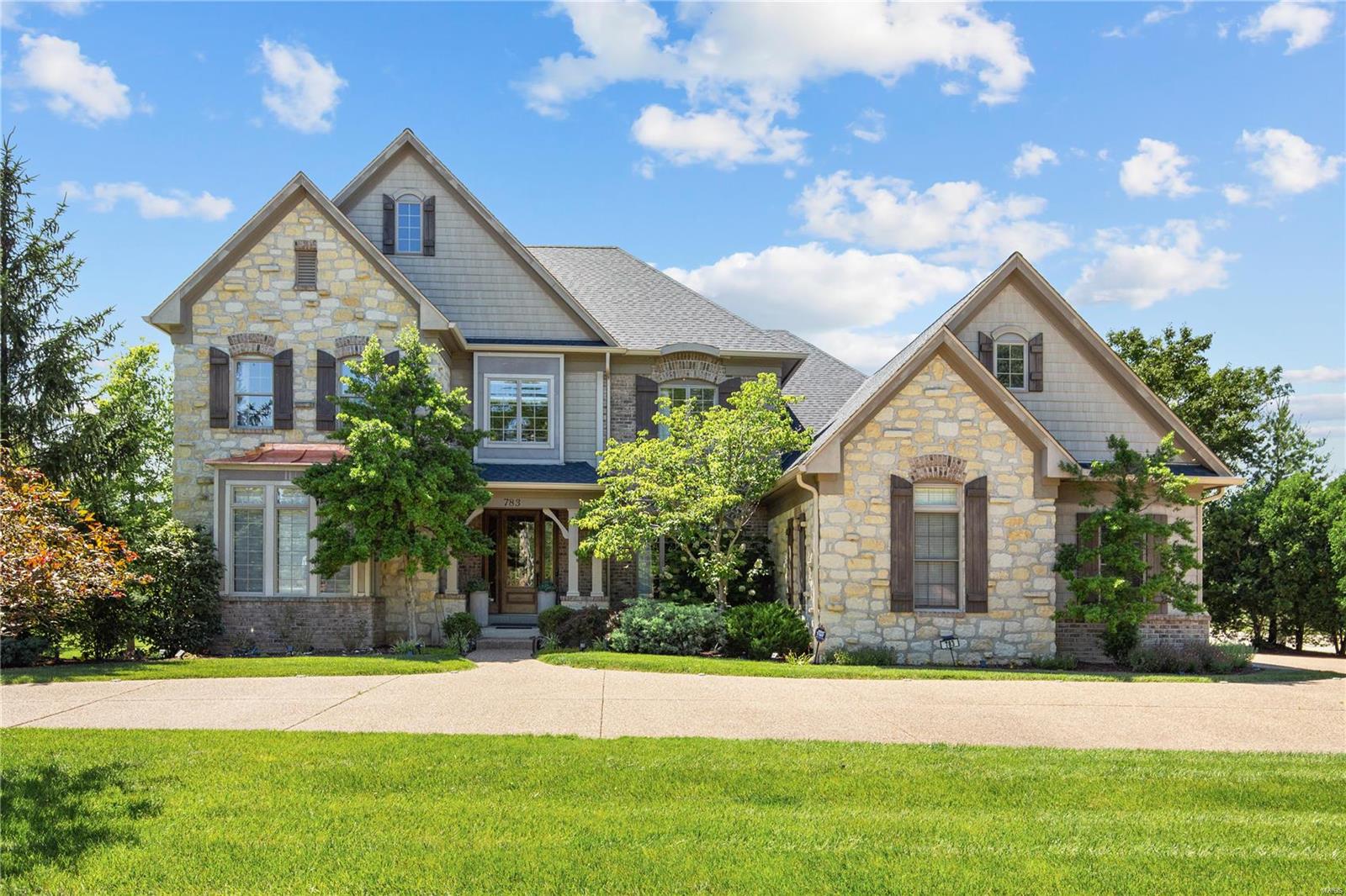 Very large and sunny home for sale, Stunning home in Creve Coeur!! Huge backyard with great sunset views. Extraordinary attention to detail in this gorgeous 1.5 story home. 1st floor offers 10' and 12’ ceilings and wood flooring. Dining room offers arched window and a spacious butler's pantry, perfect for entertaining. Large, open great room features beamed ceiling, wall of windows and fireplace. Kitchen, breakfast room and hearth room are incredible! There is an over sized island with prep area, double ovens, warming drawer and granite counters. Beautiful cherry custom cabinets, some with glass doors. Inviting hearth room welcomes you with its 2 walls of windows and stone fireplace. Gracious main floor master suite with over sized, walk in organized closet. Upstairs offers 3 generous bedrooms and an ample, bright bonus room. New roof and gutter in 2022, additional 2000+ finished basement space with a full bath that was completed in 2021. Owner/Agent.